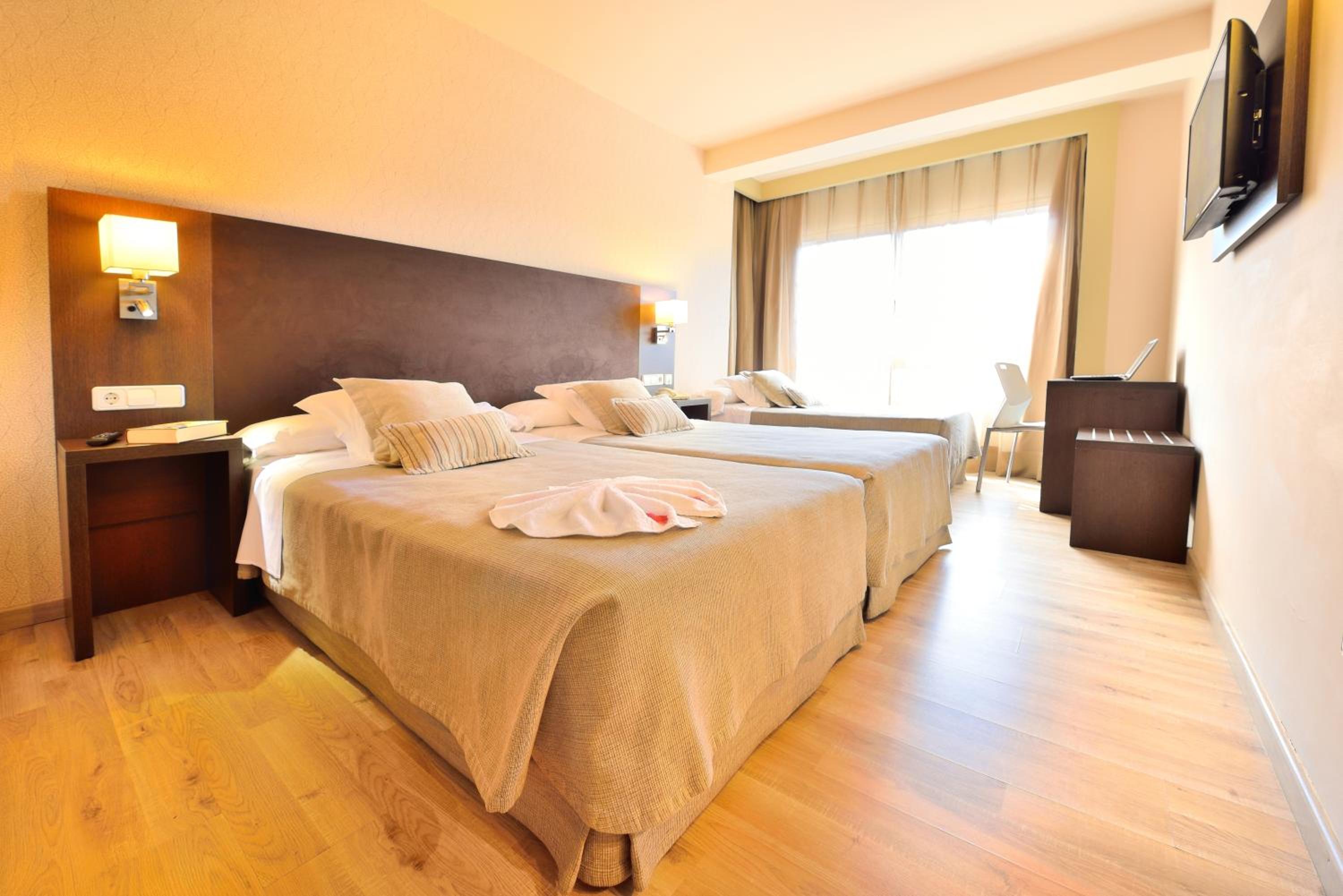 Habitación Doble con Cama Extra (2 Adultos + 1 Niño) Acceso al Spa incluido