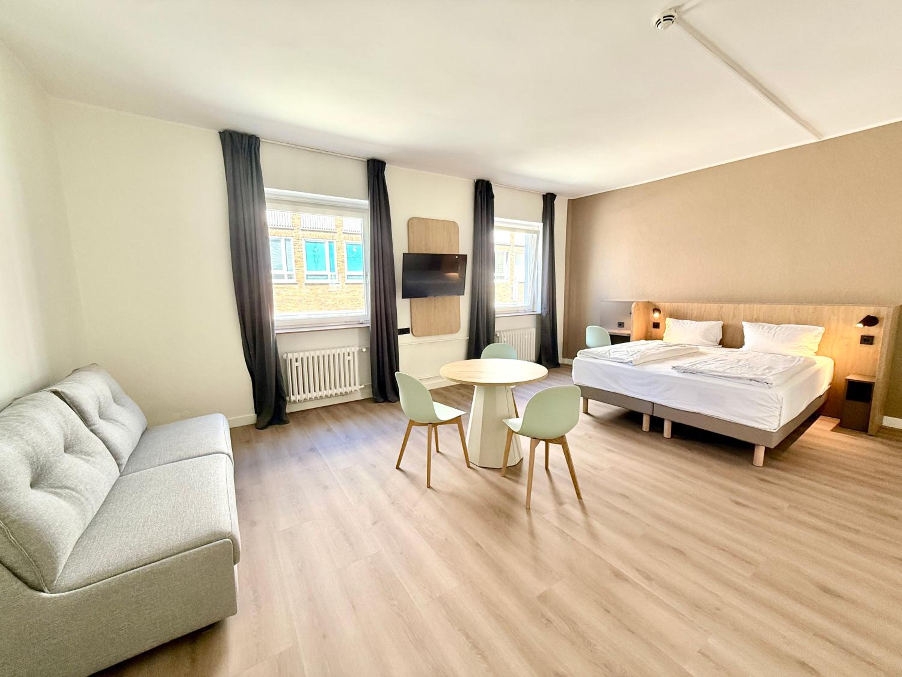 Standard Room - 1 Queen Bed 1 Sofa Bed Double