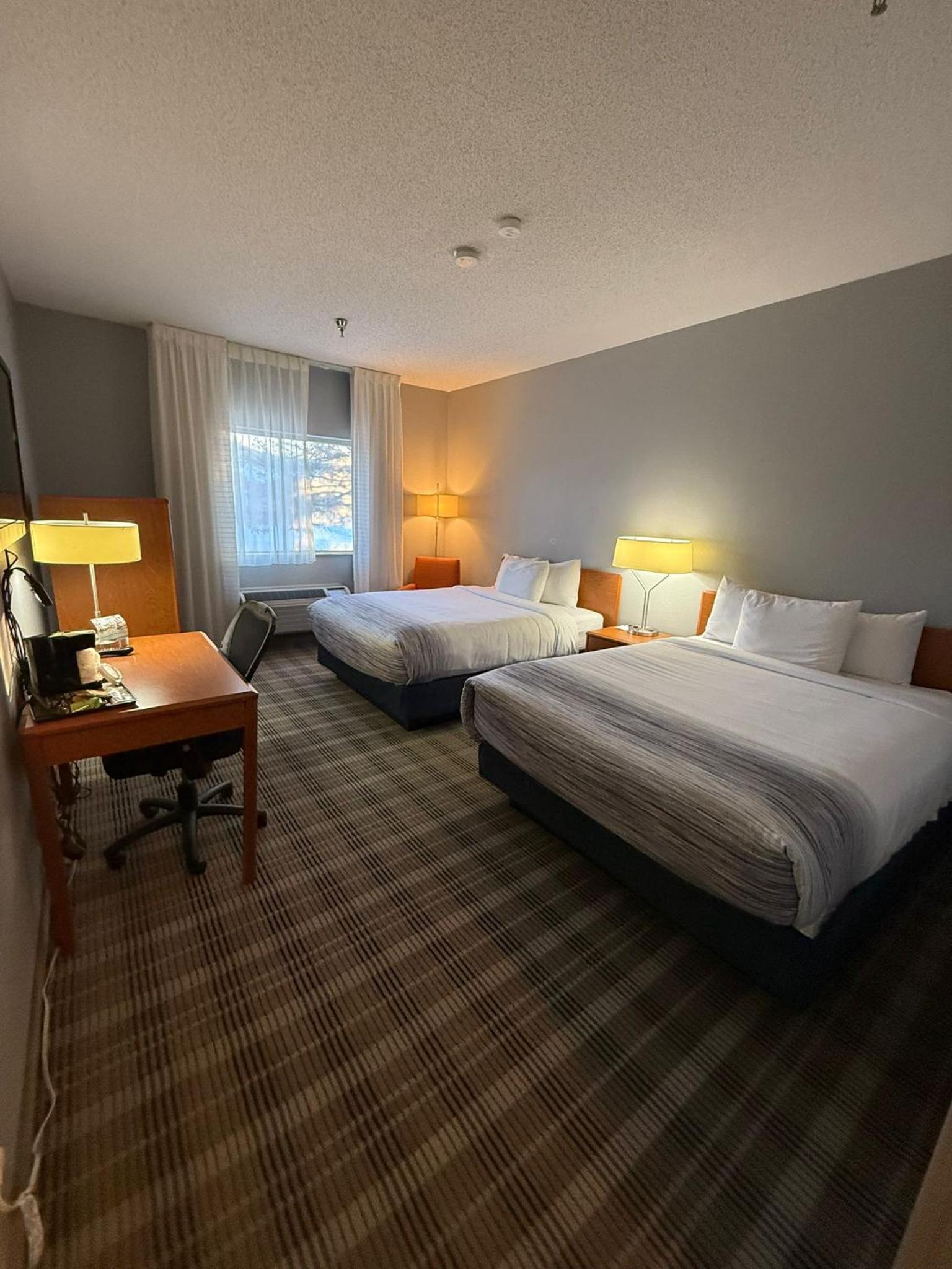 Queen Room with Two Queen Beds - Non-Smoking - Photo 1