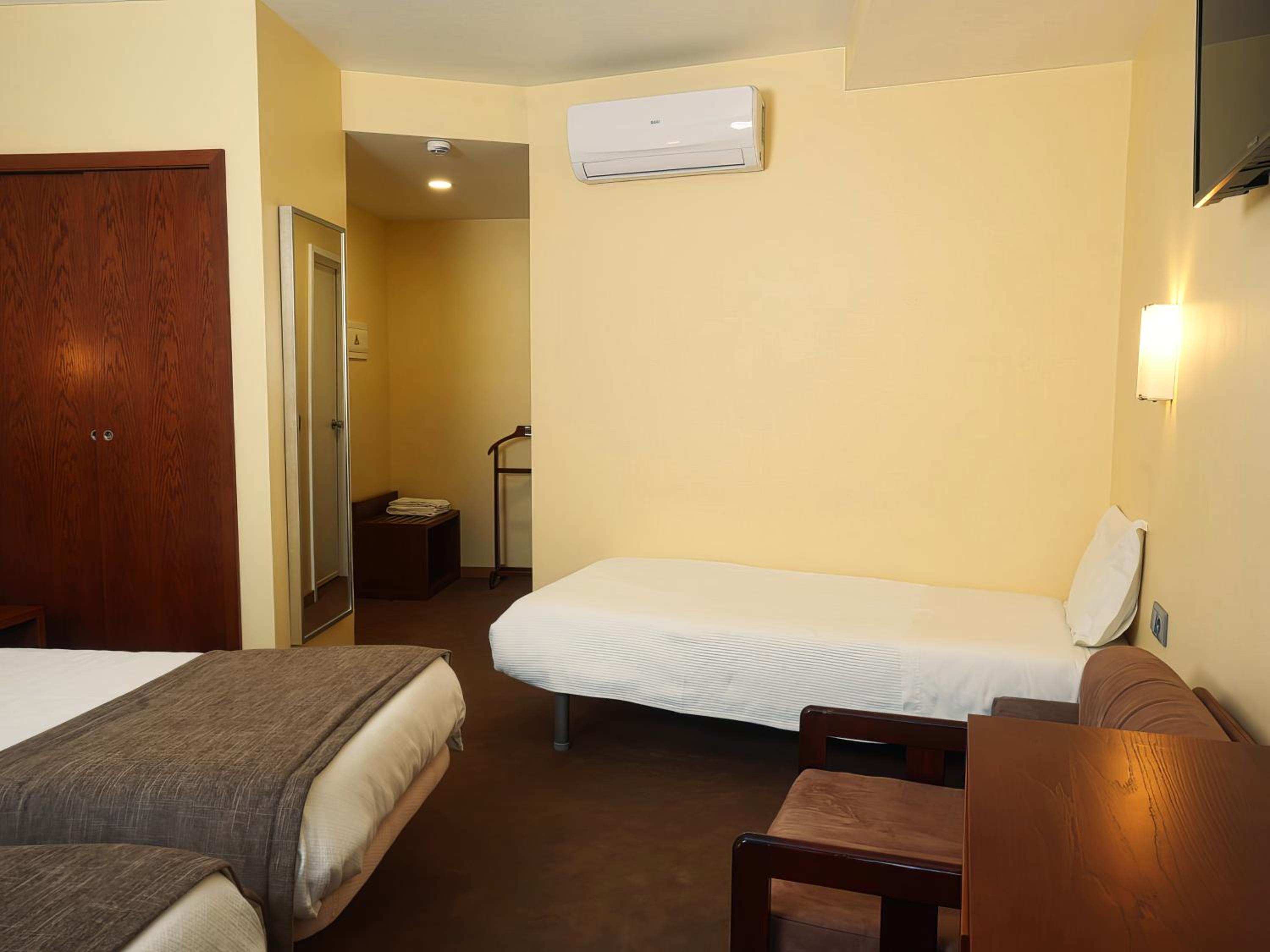 Triple Room - Photo 9