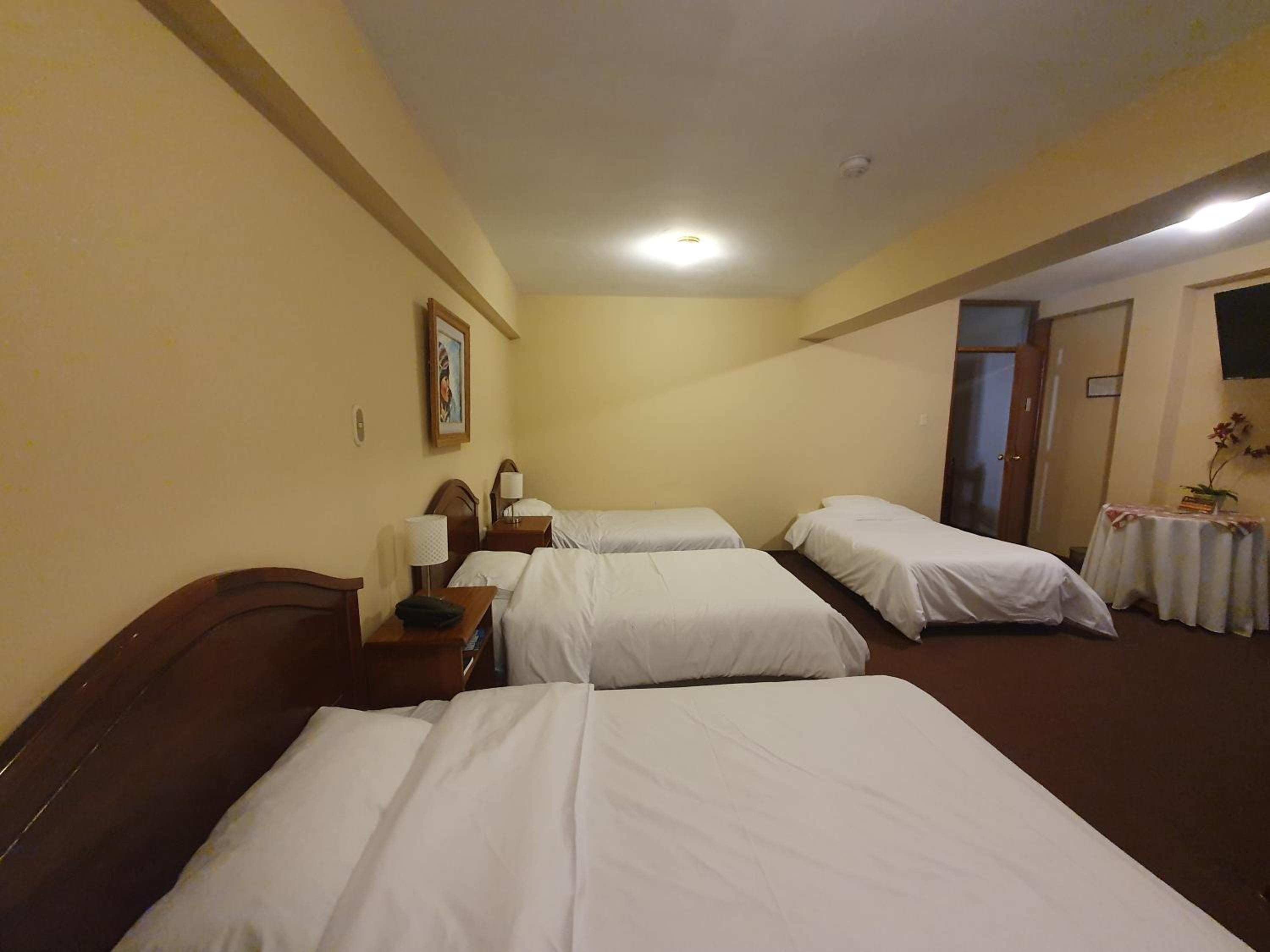 Standard Quadruple Room - Photo 4