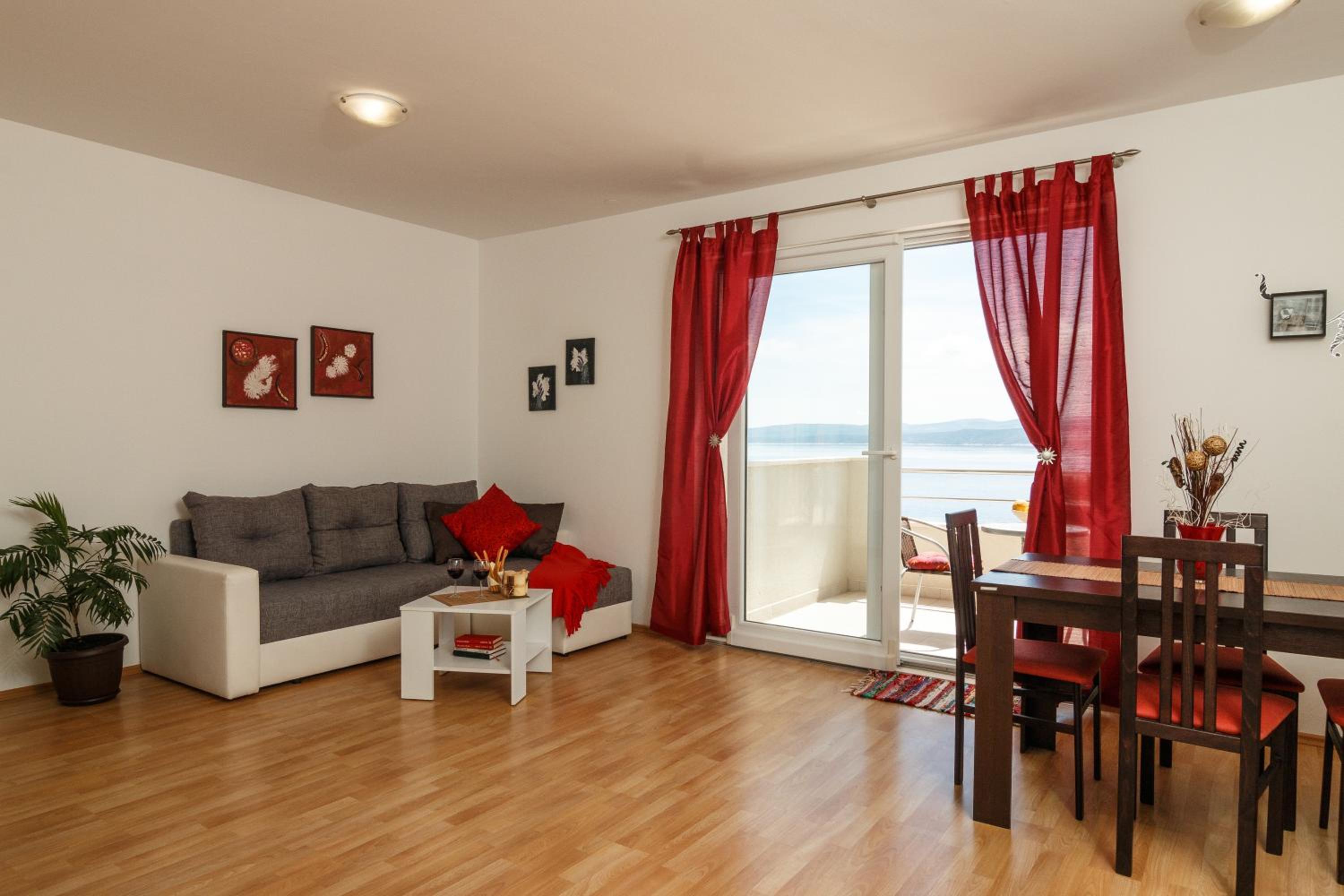 One-Bedroom Apartment with Balcony and Sea View