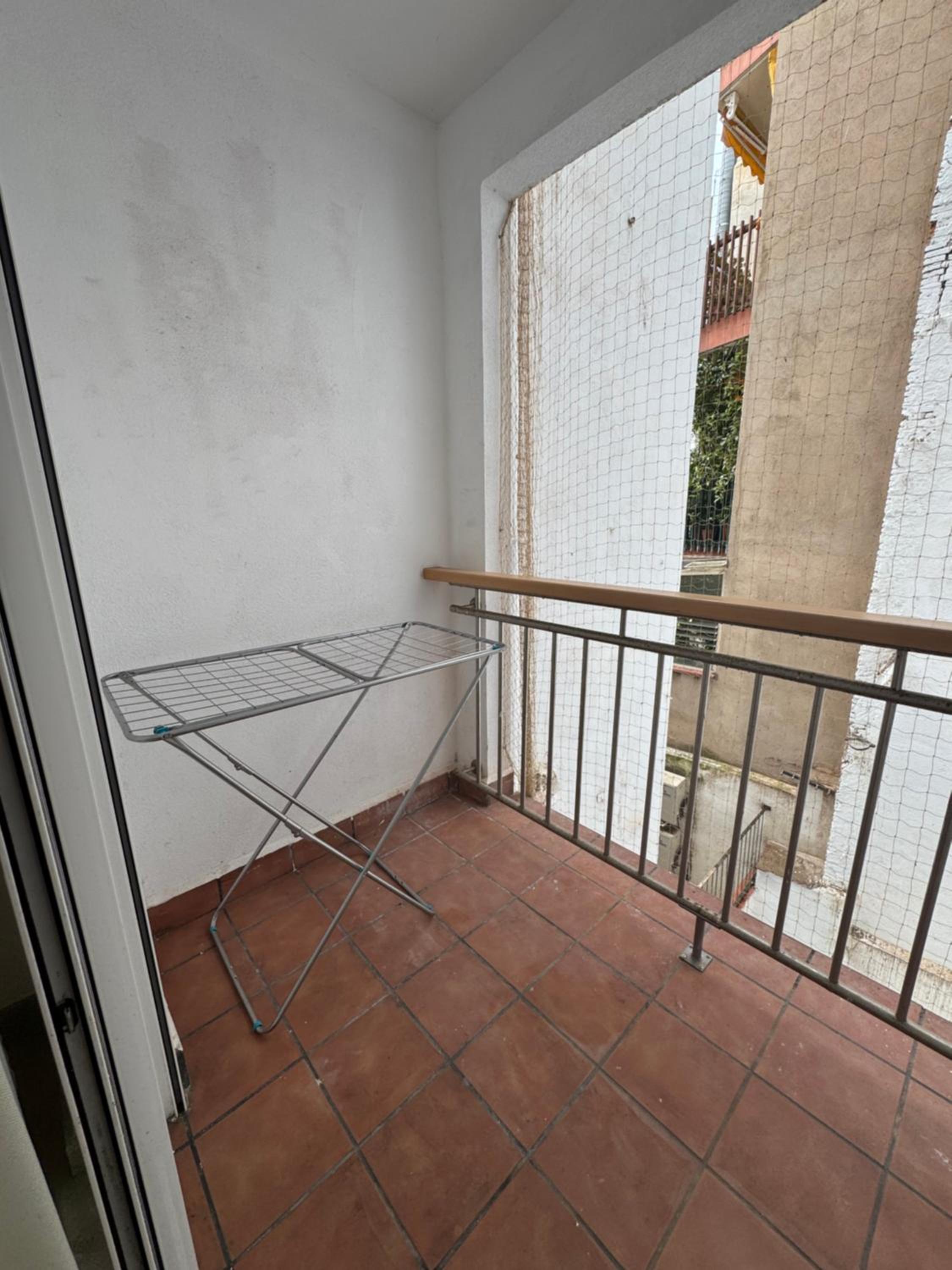 Three-Bedroom Apartment with Balcony