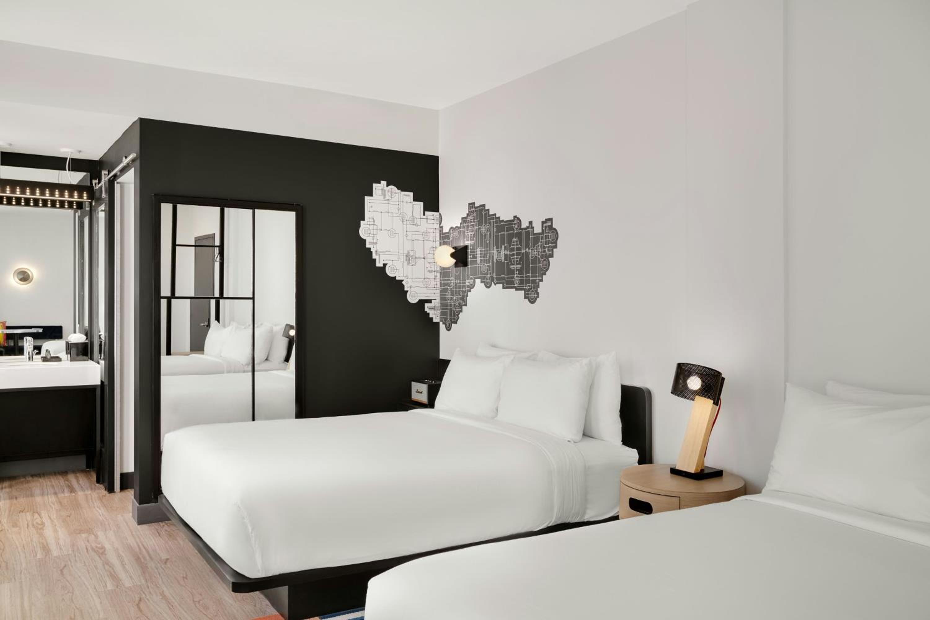 Queen Room with Two Queen Beds - Hearing Accessible - Photo 1