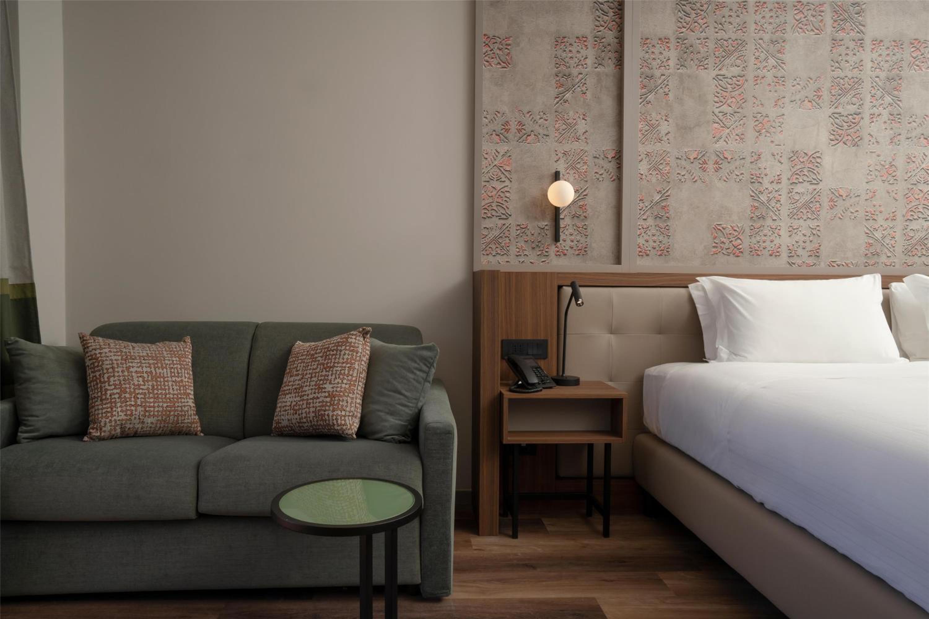 Deluxe Twin Room with Sofa Bed and Balcony