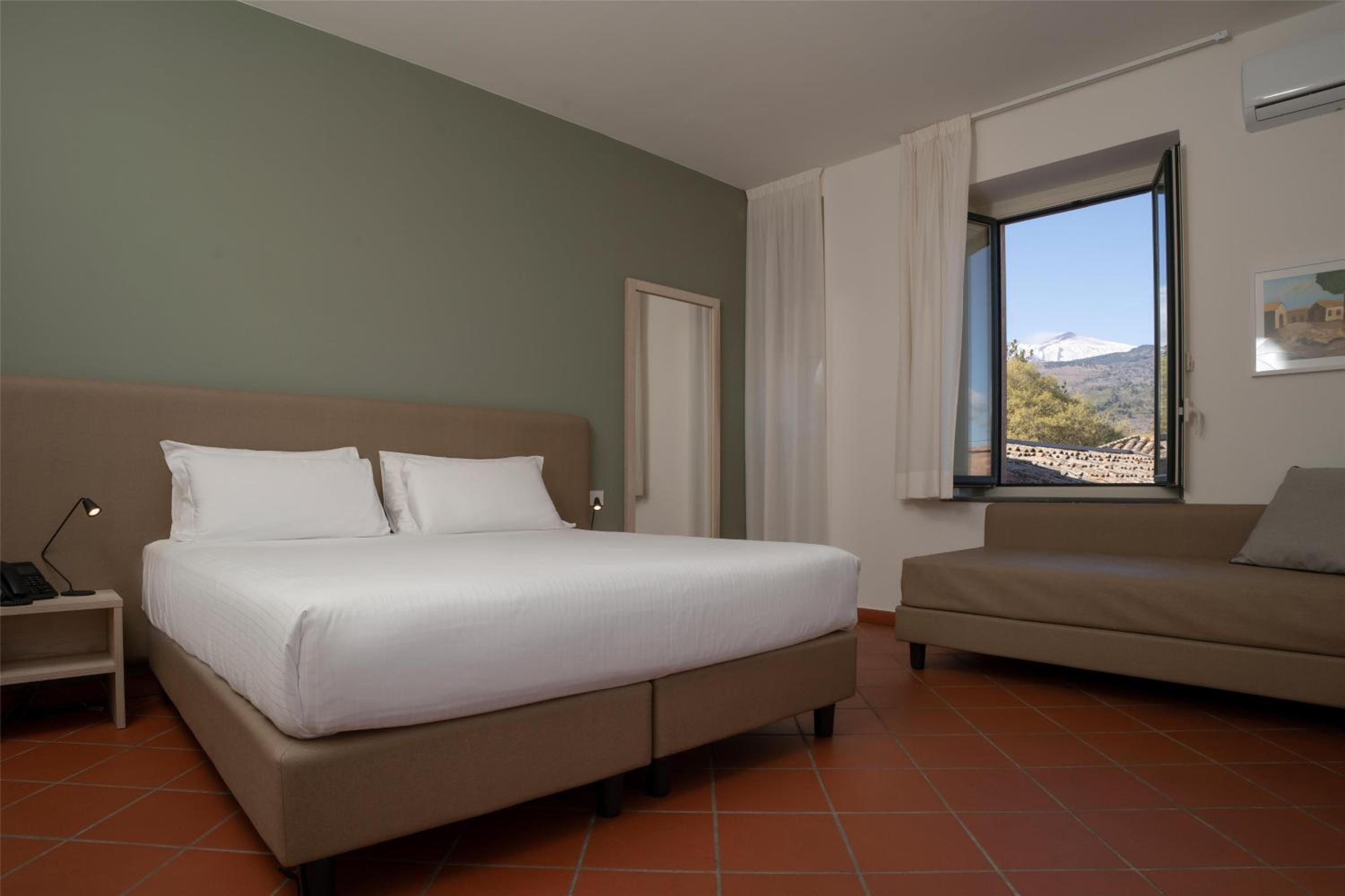 Club House Twin Room with Sofa and Balcony thumbnail 5