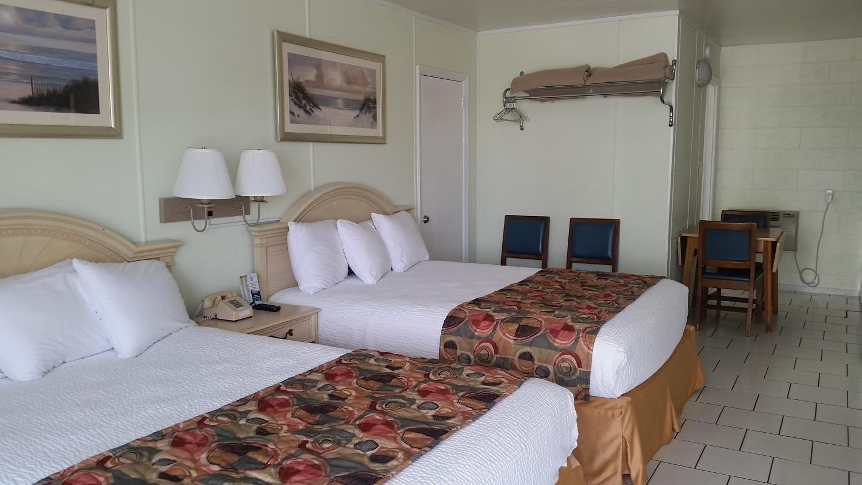 Deluxe Queen Room with Two Queen Beds and Pool View photo 1