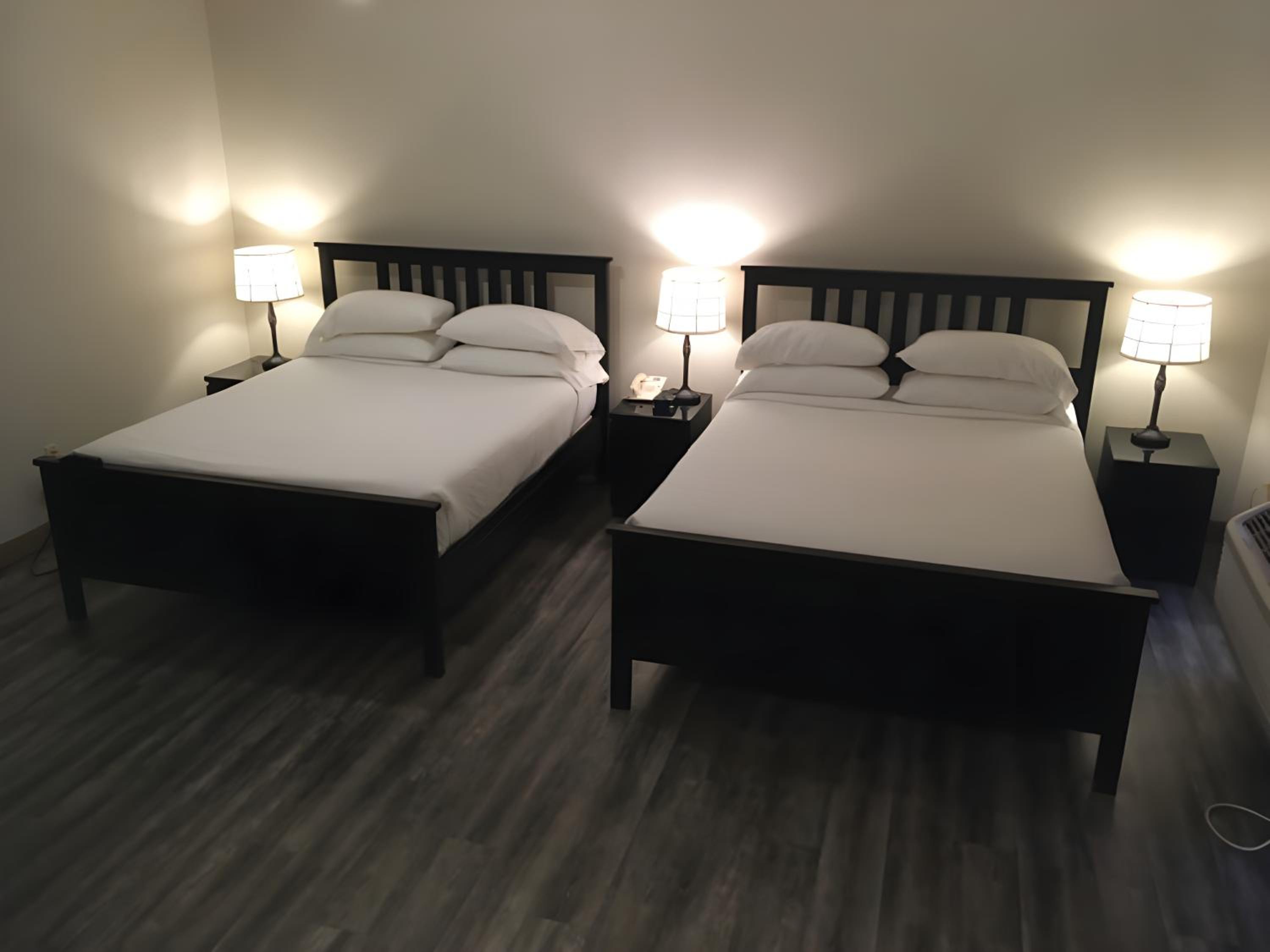 Deluxe Queen Room with Two Queen Beds - Photo 1
