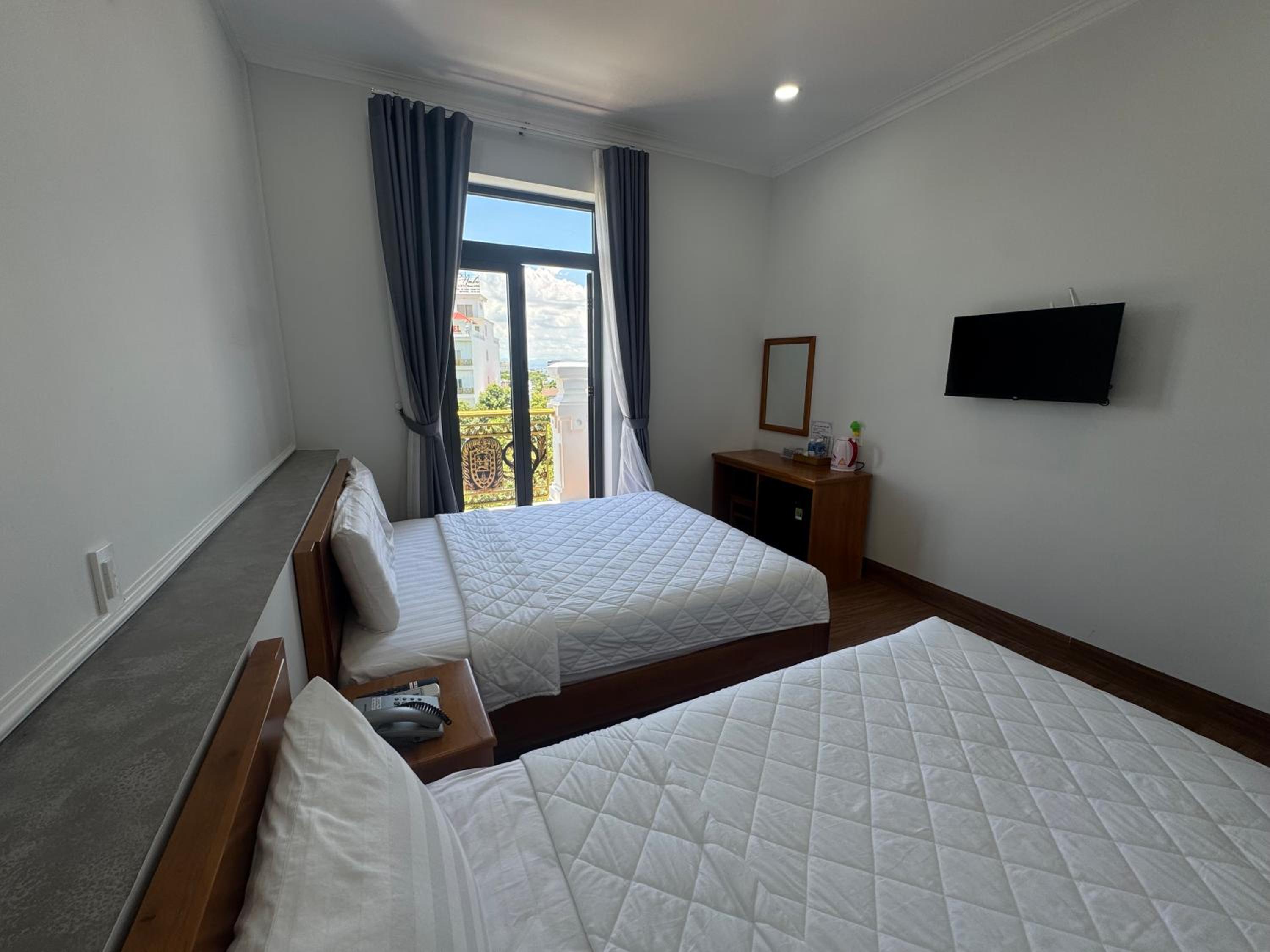 Deluxe Triple Room