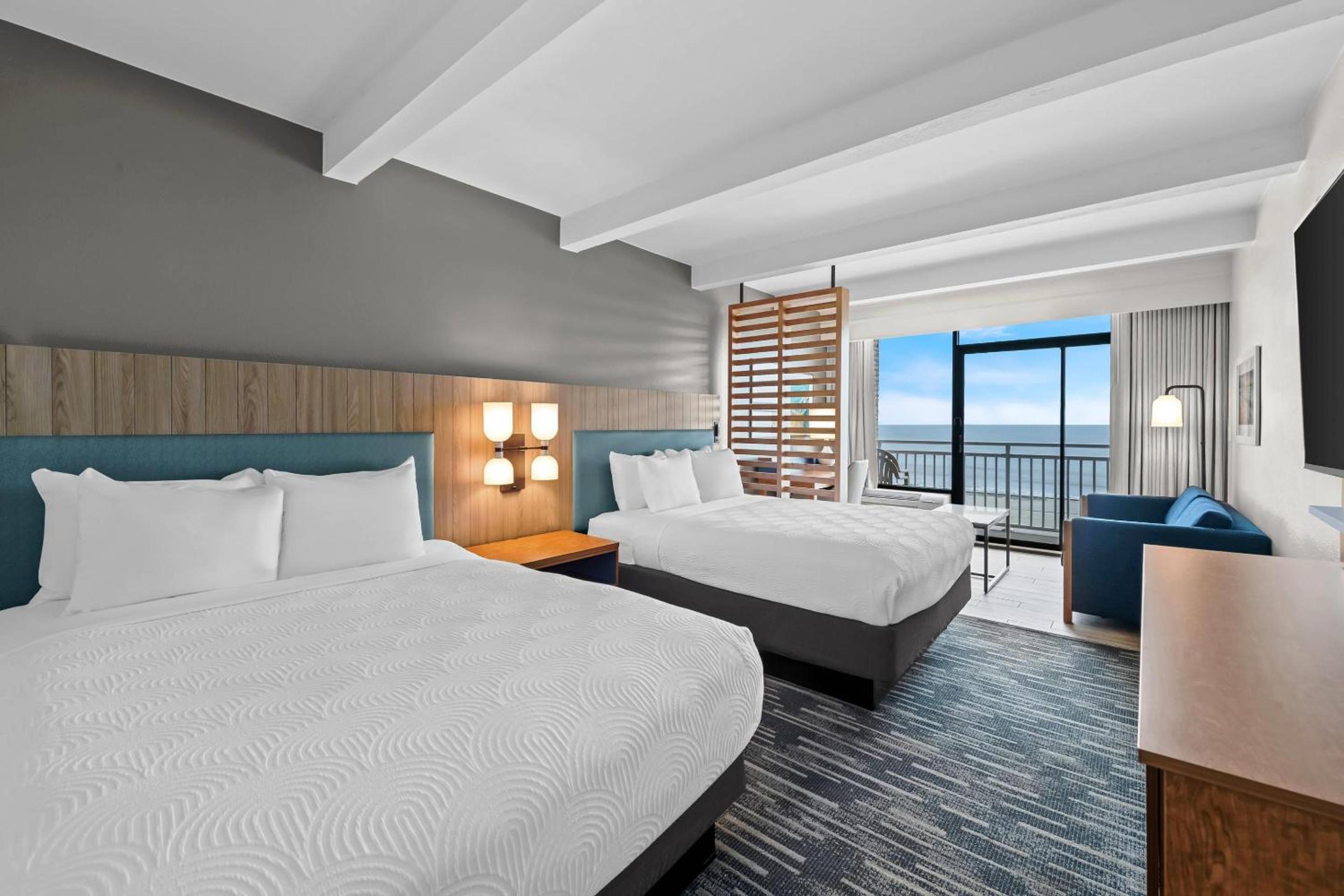 Deluxe Queen Suite with Two Queen Beds and Sofa Bed - Non-Smoking