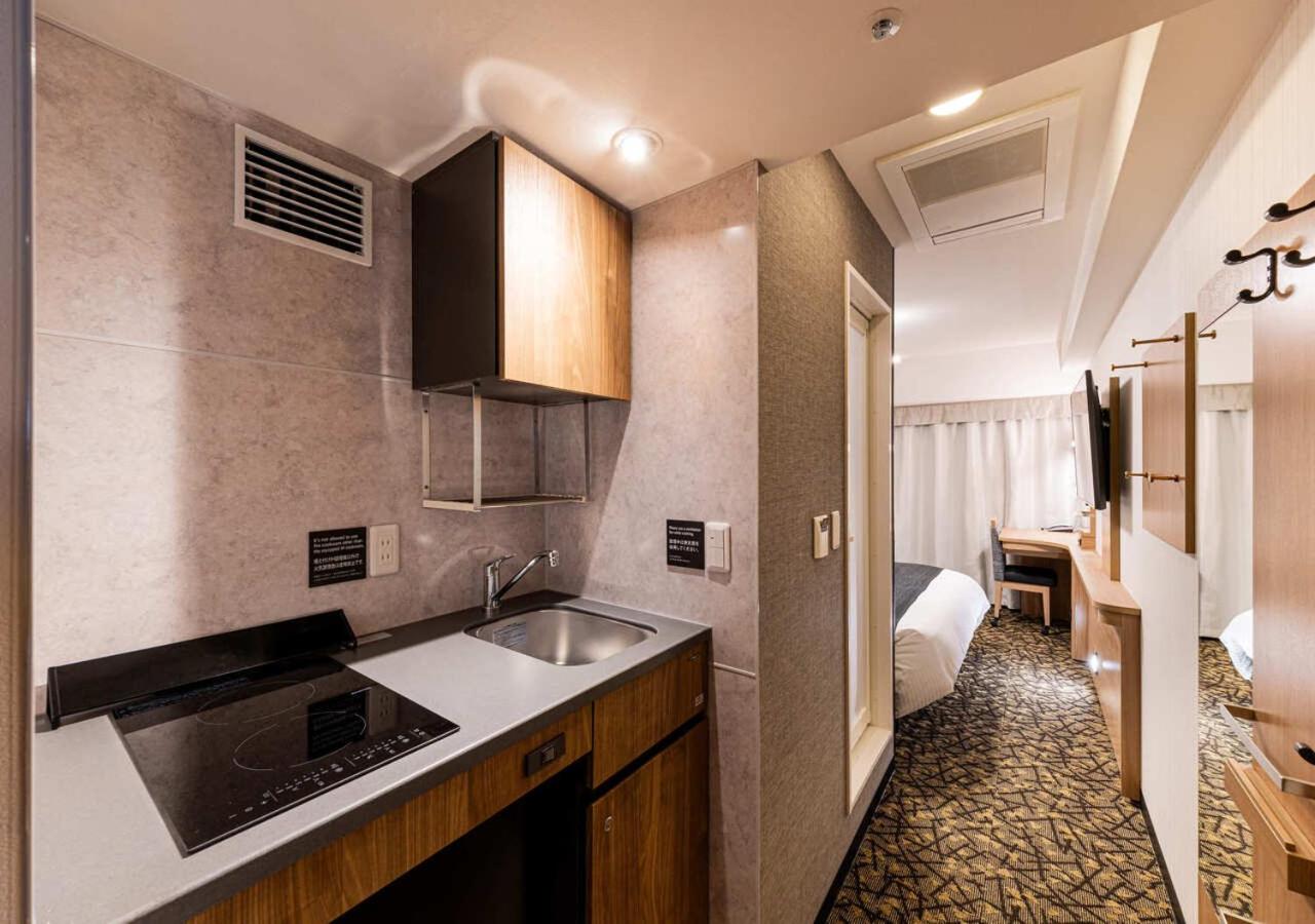King Room - Non-Smoking with Kitchen - Photo 1