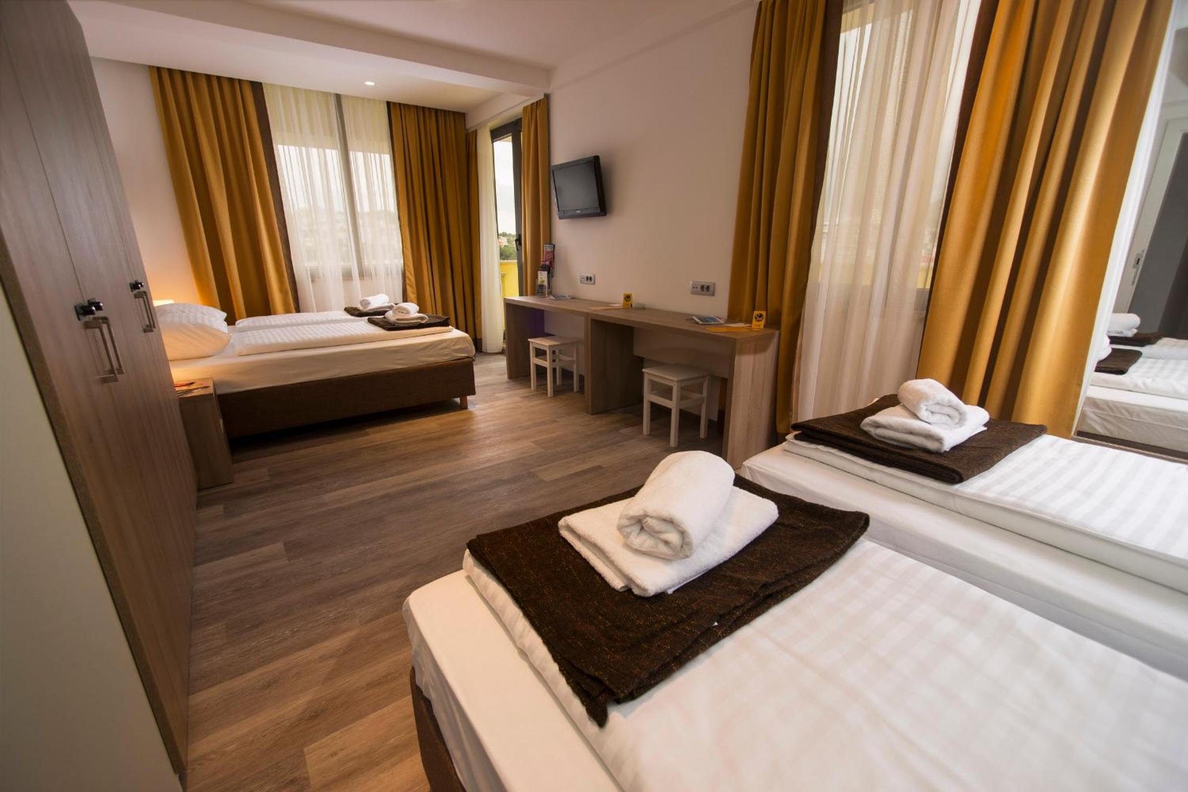 Quadruple Room with Balcony photo 1