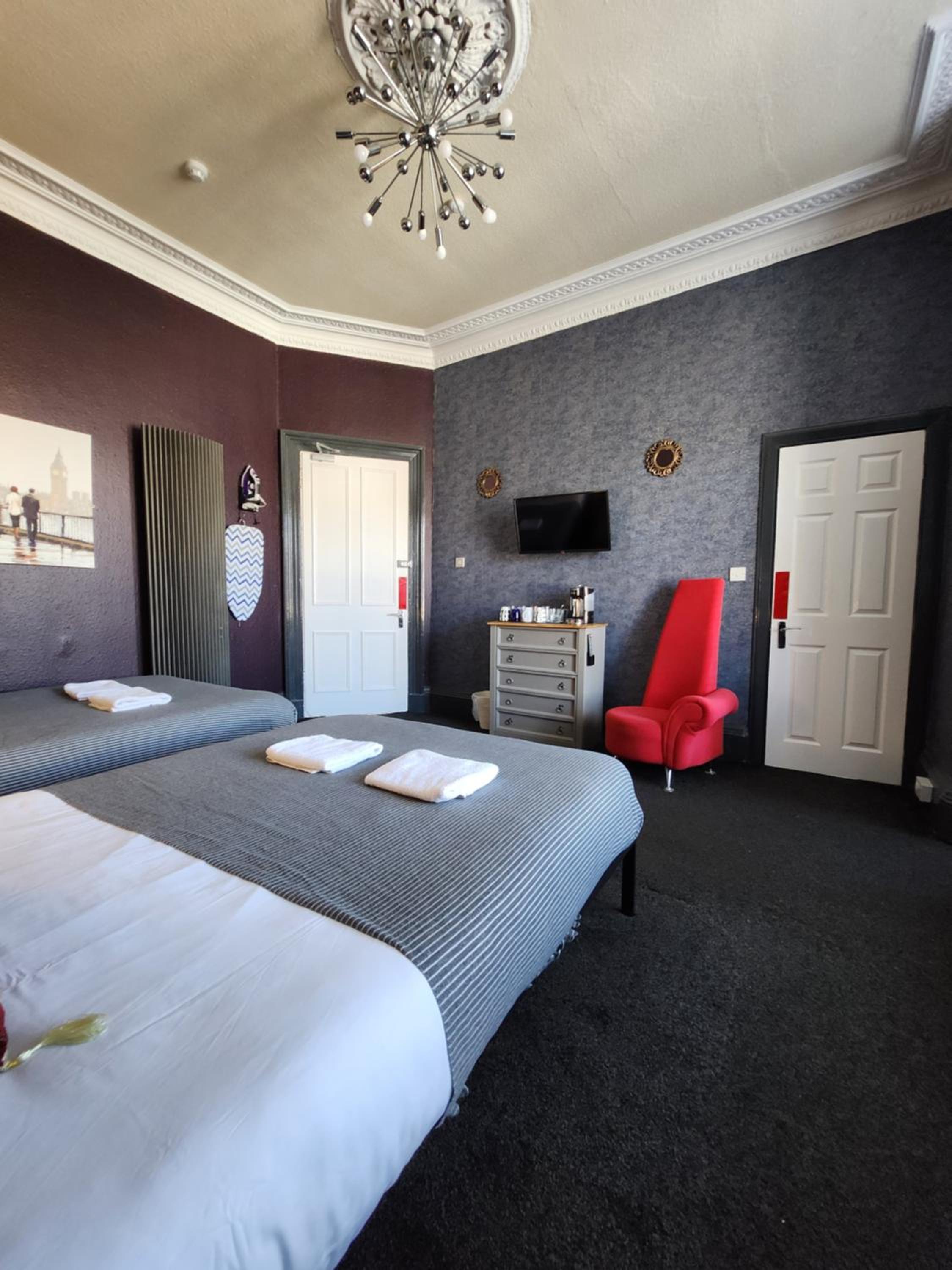 Deluxe Quadruple Room - Photo 7