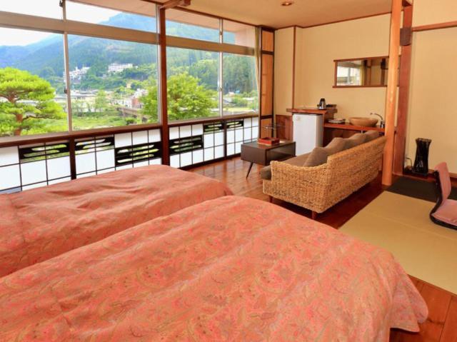 Twin Room with Tatami Area - Breakfast Included