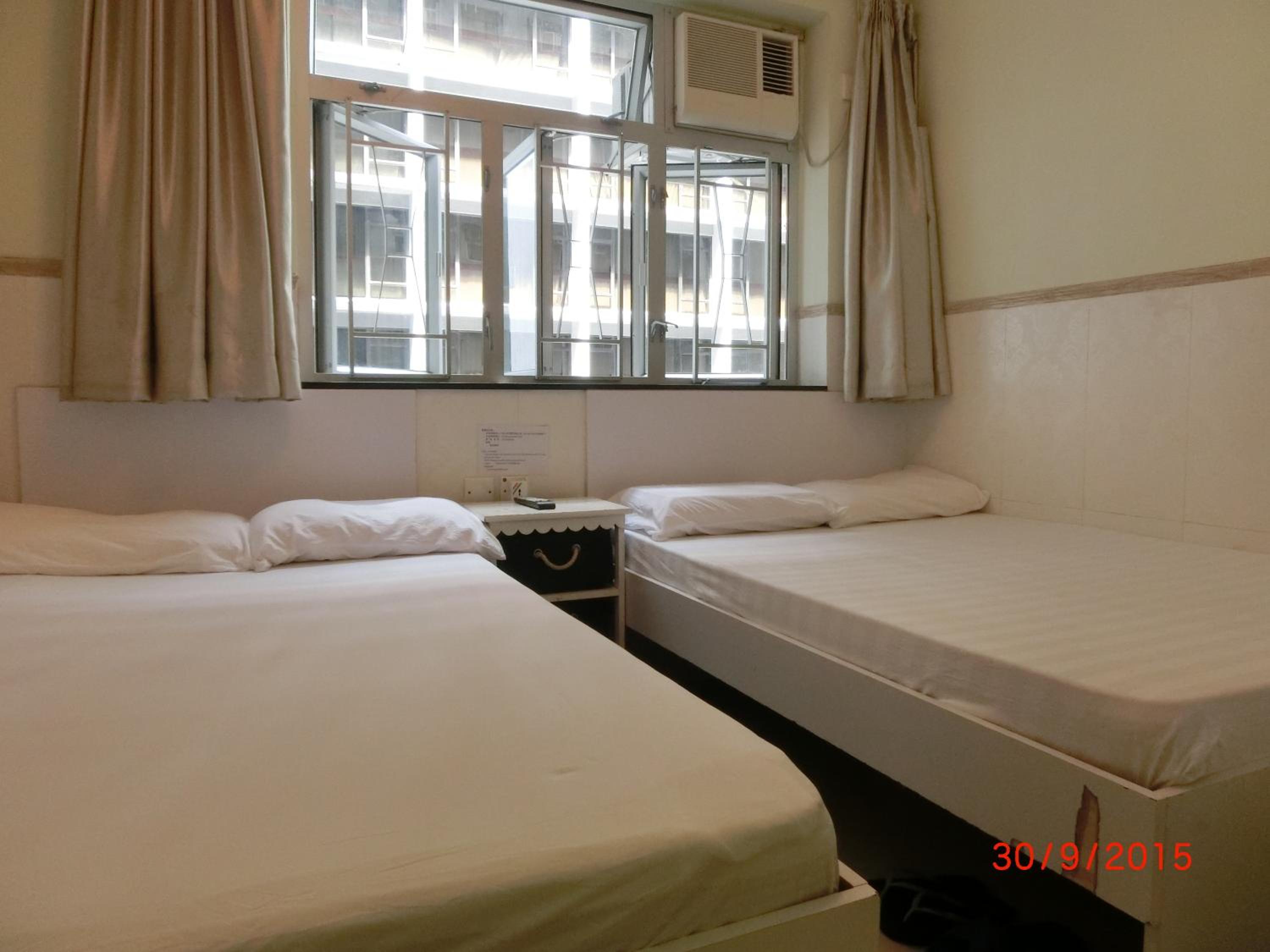 Quadruple Room with Private Bathroom