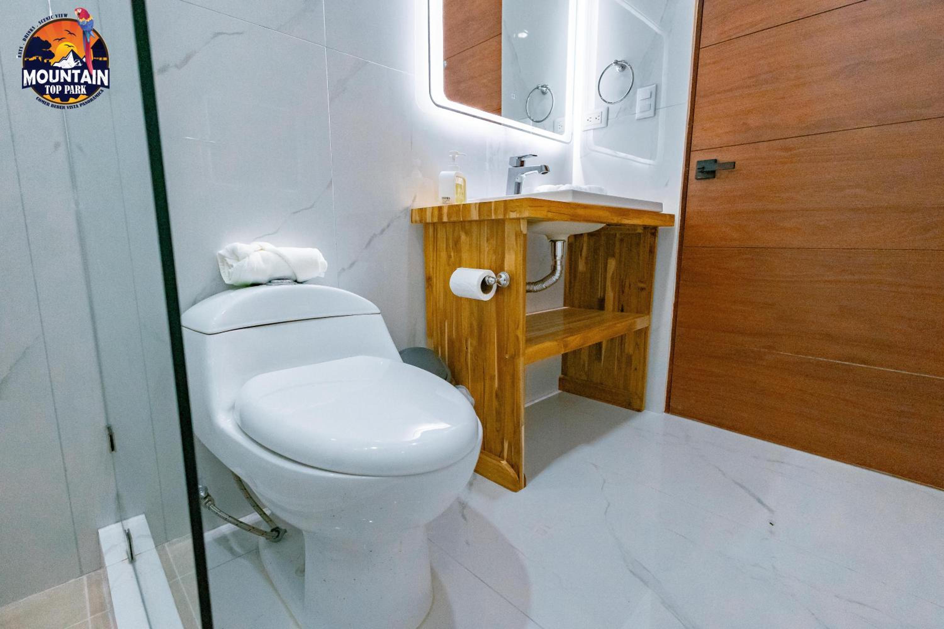 Deluxe Queen Room with Two Queen Beds and Partial Sea View