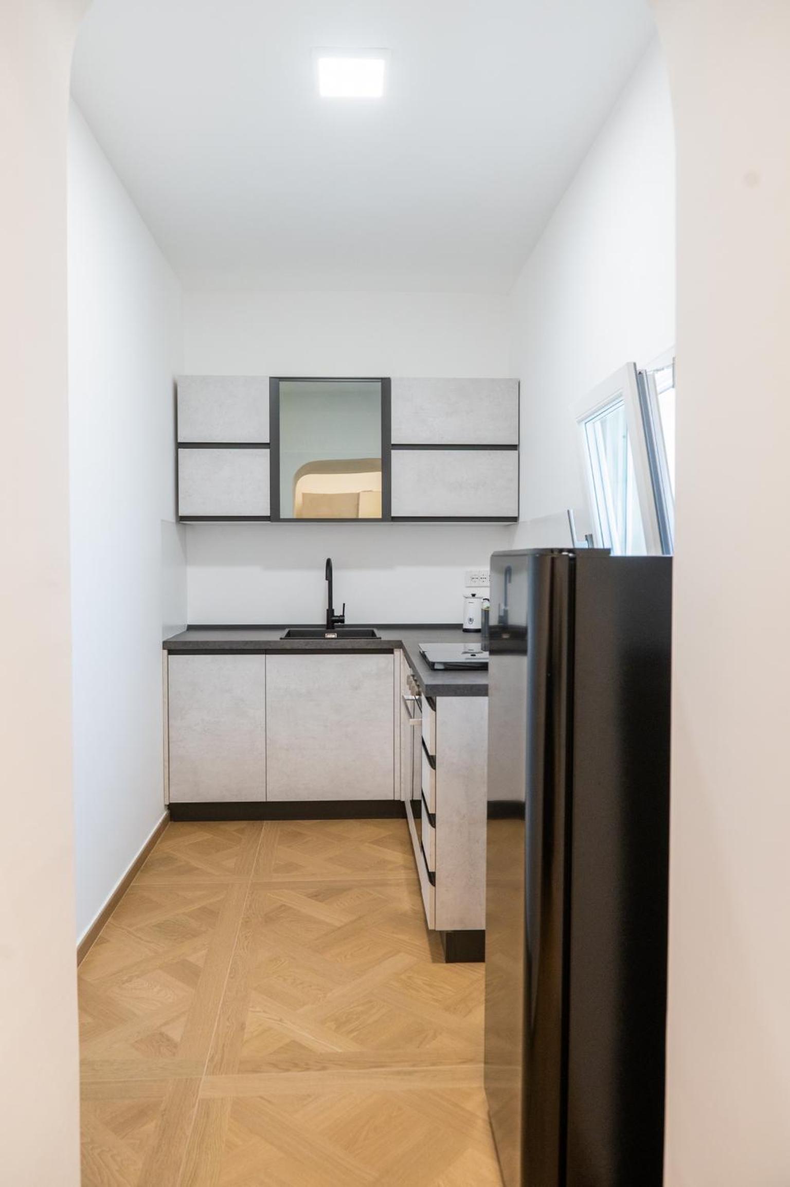 Quadruple Room with Private Bathroom