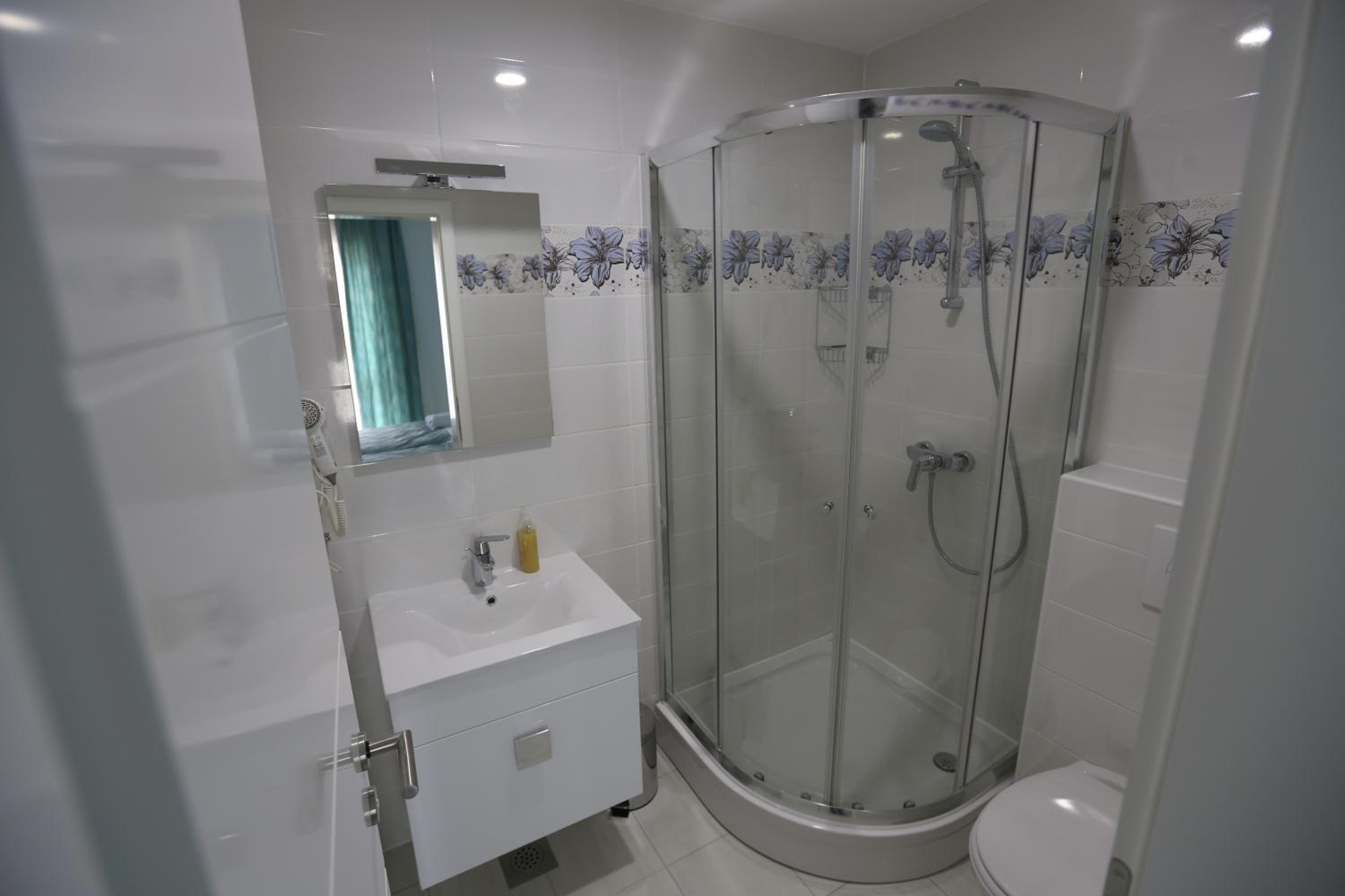 Quadruple Room with Balcony photo 2