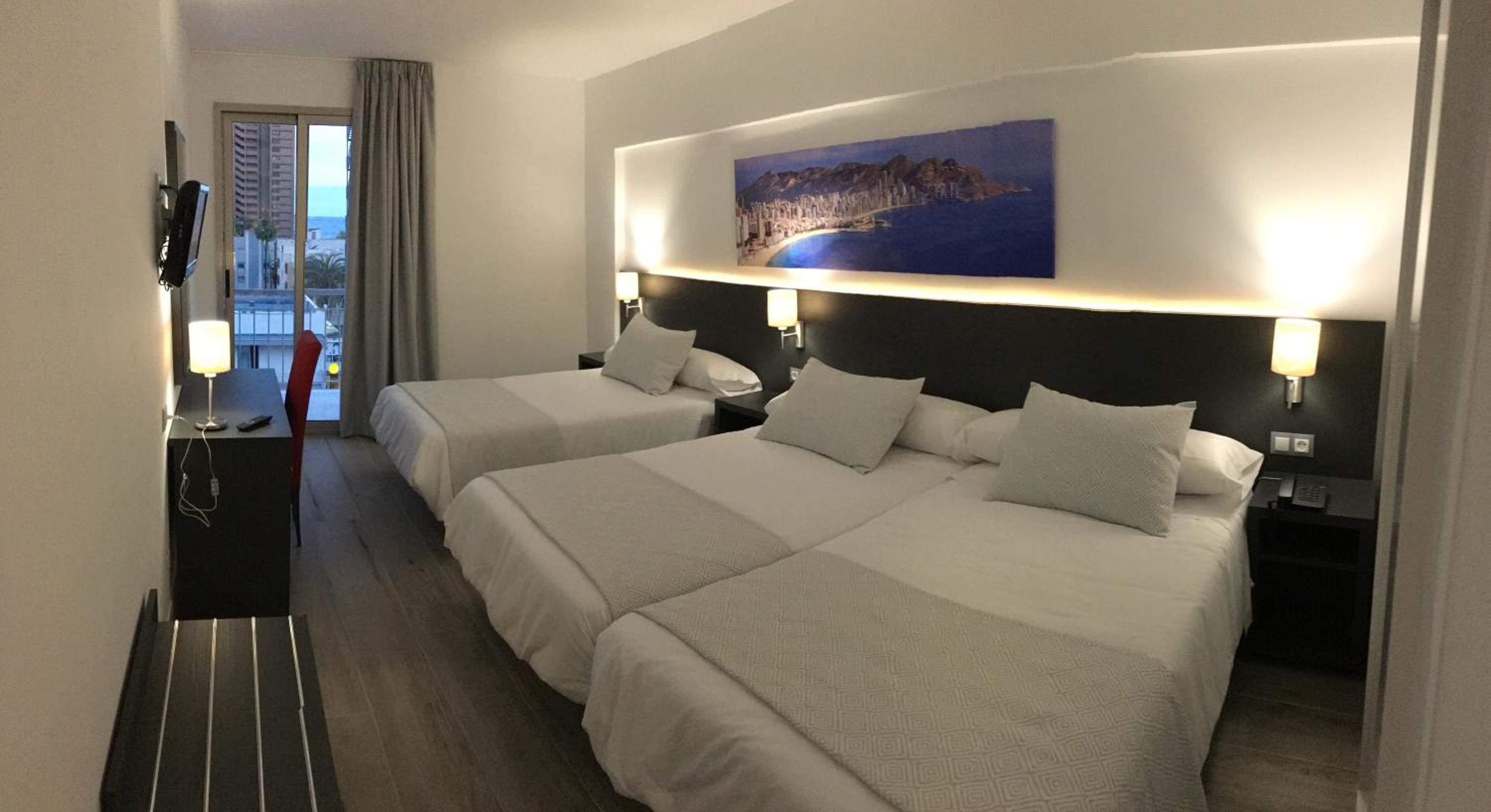 Habitación Triple con Balcón