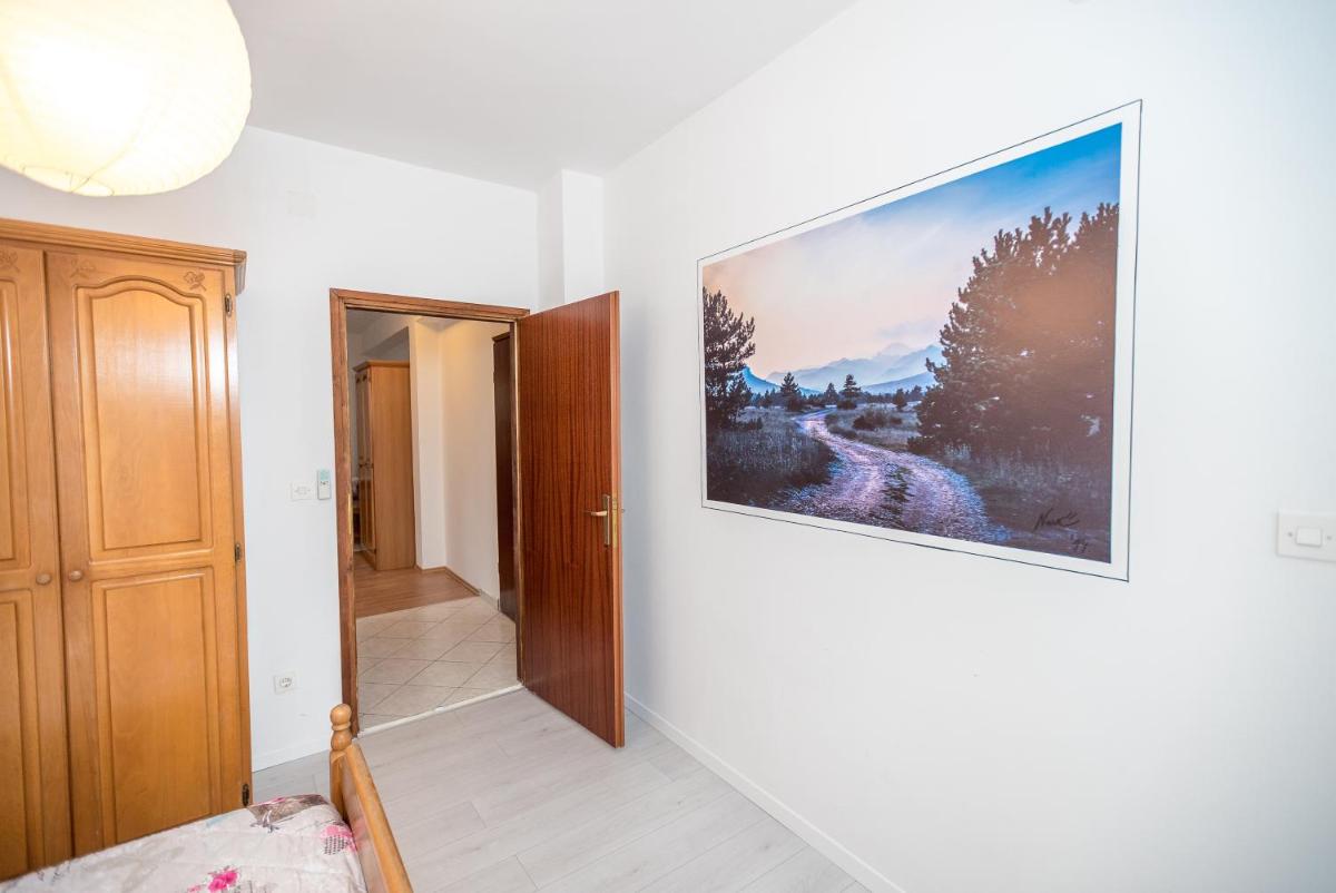One-Bedroom Apartment with Balcony and Garden View photo 1