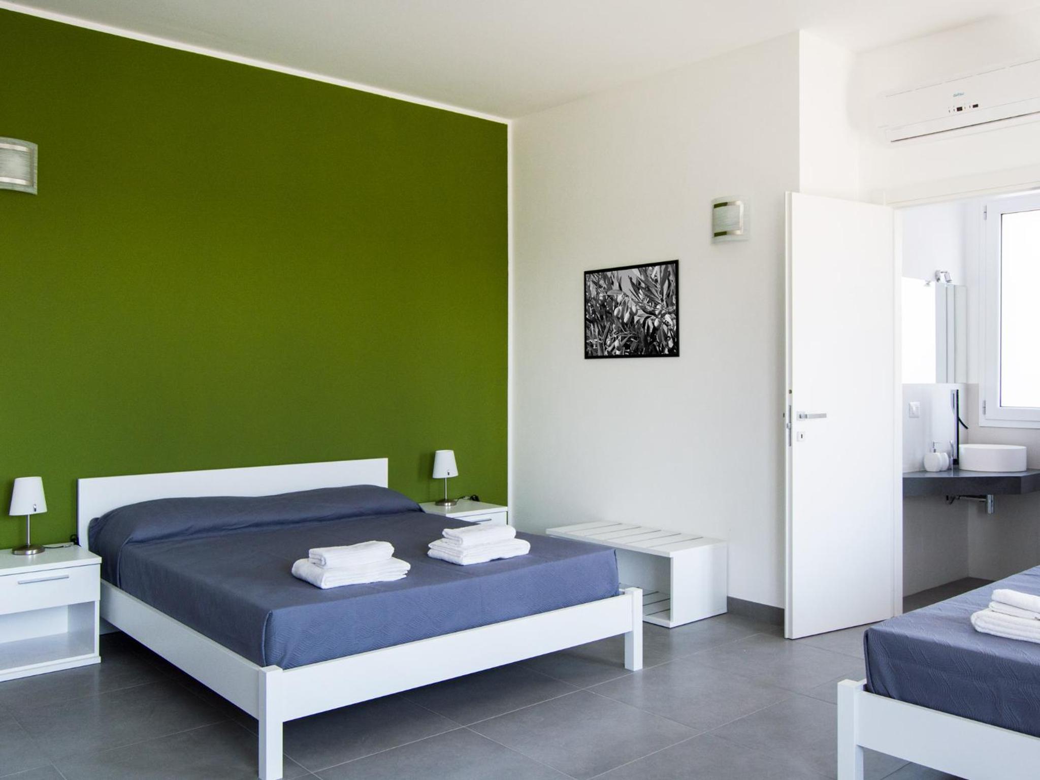 Quadruple Room with Balcony photo 2