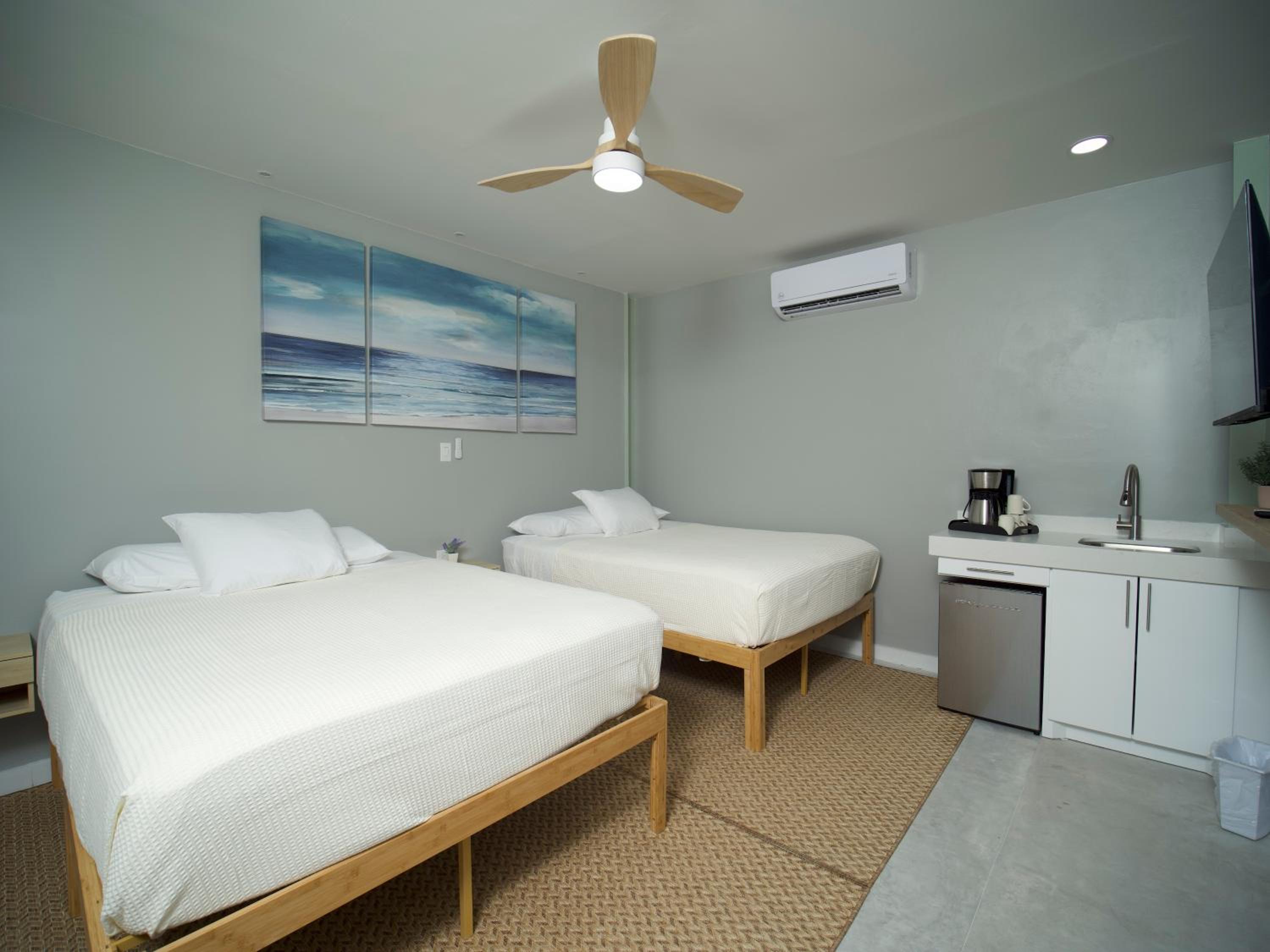 Quadruple Room Beachfront with Balcony