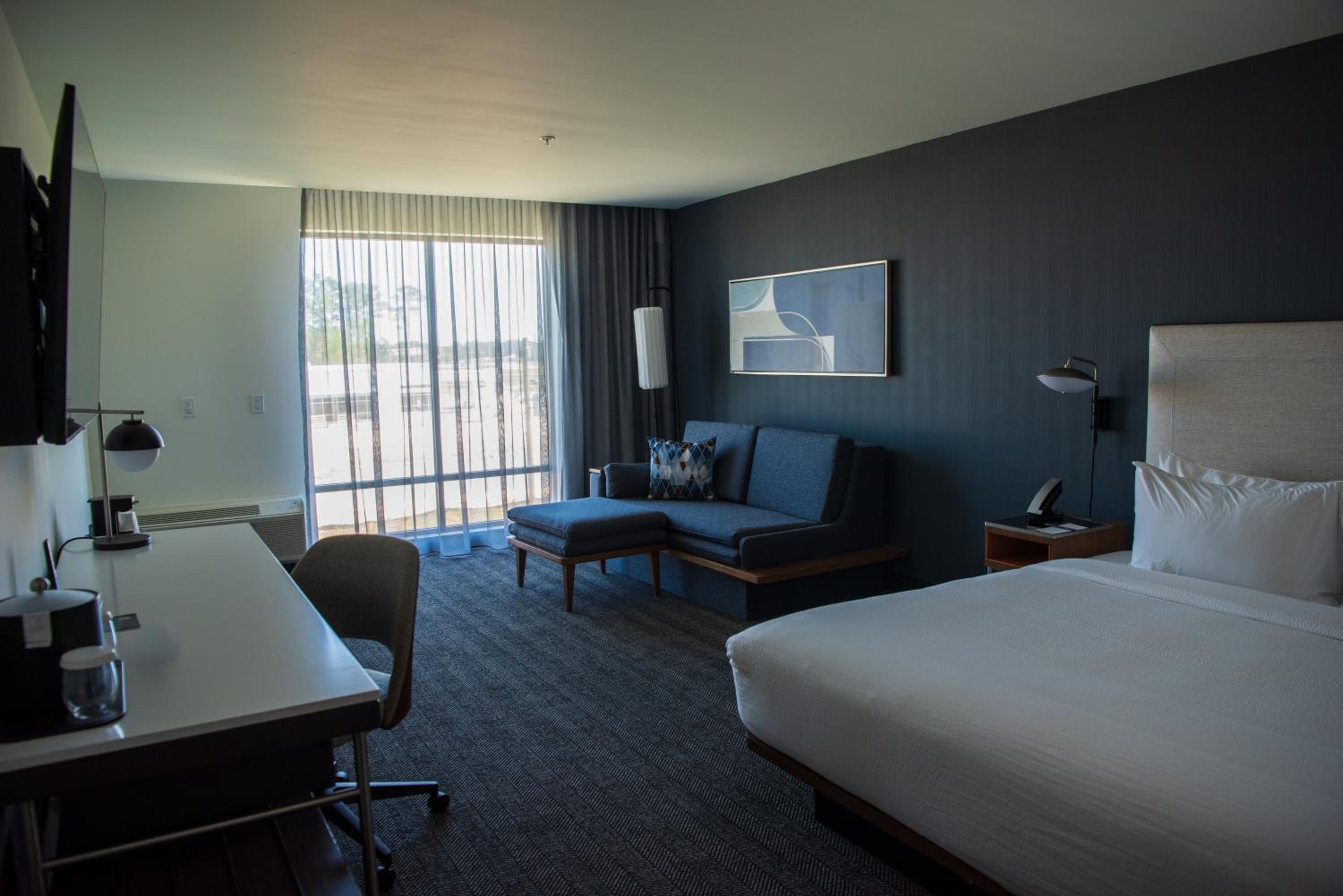 King Room with Sofa Bed and Roll-in Shower - Mobility and Hearing Accessible - Photo 4