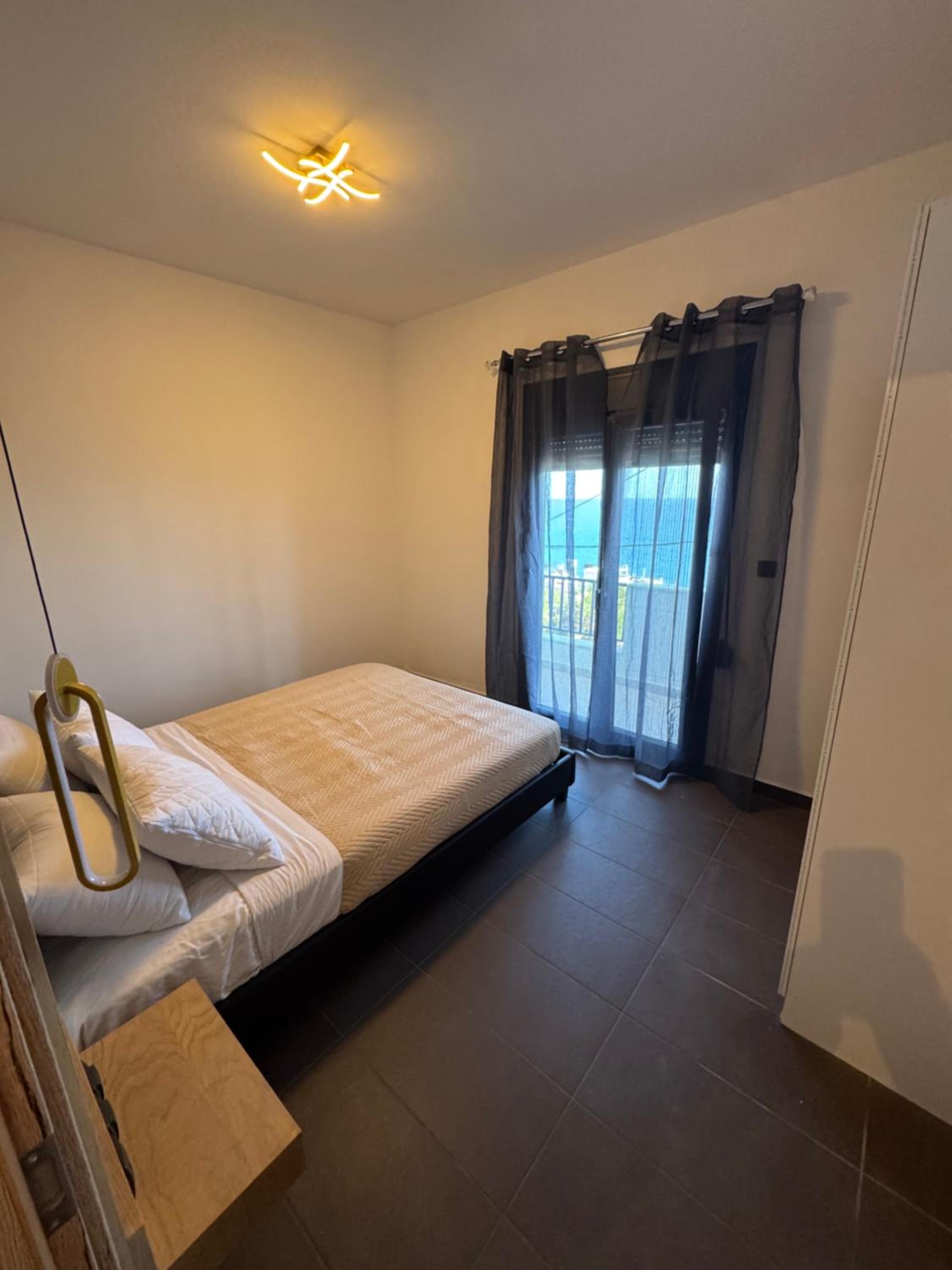 Two-Bedroom Apartment with Balcony and Sea View
