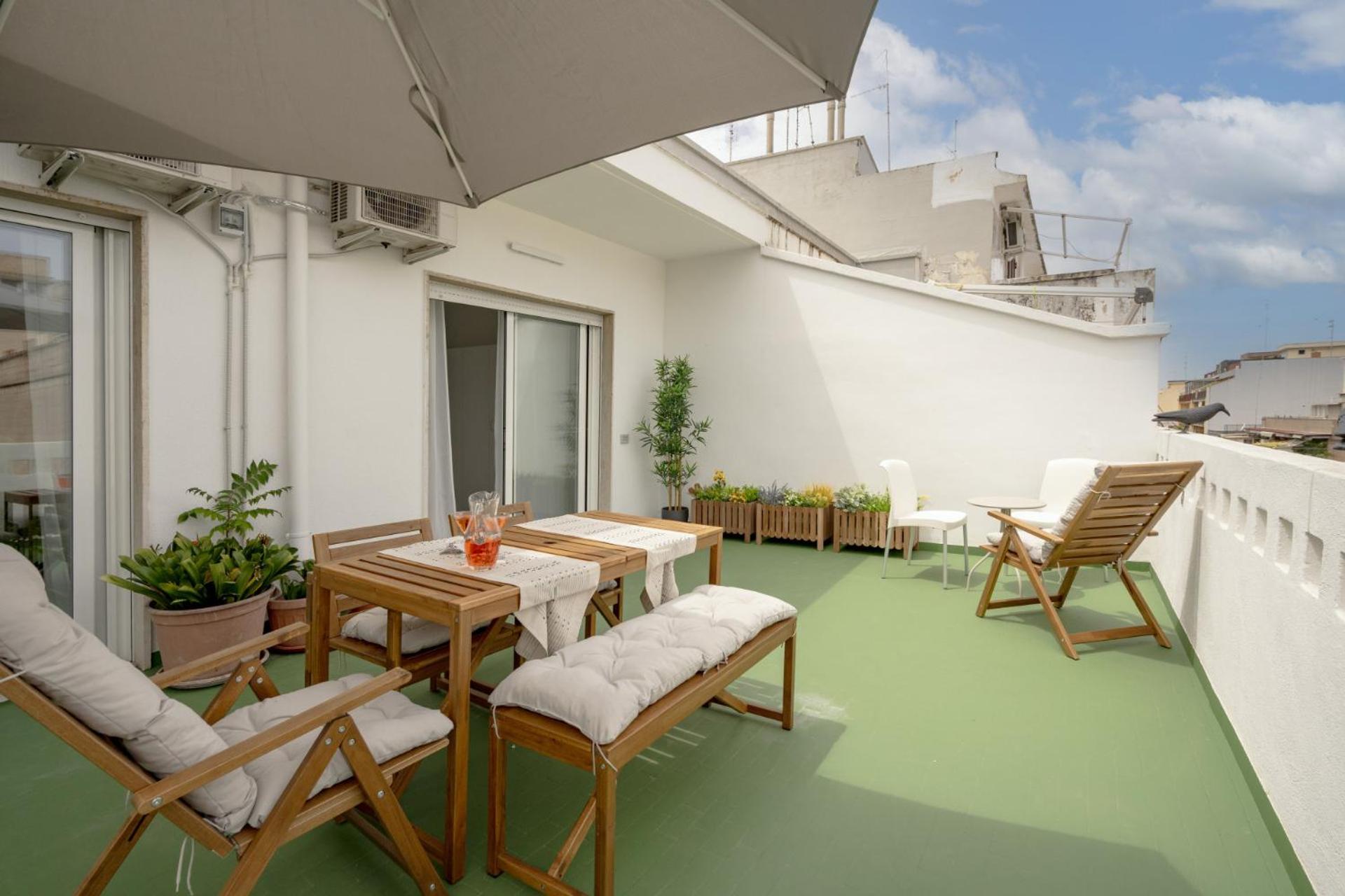 Two-Bedroom Apartment with Balcony and Terrace