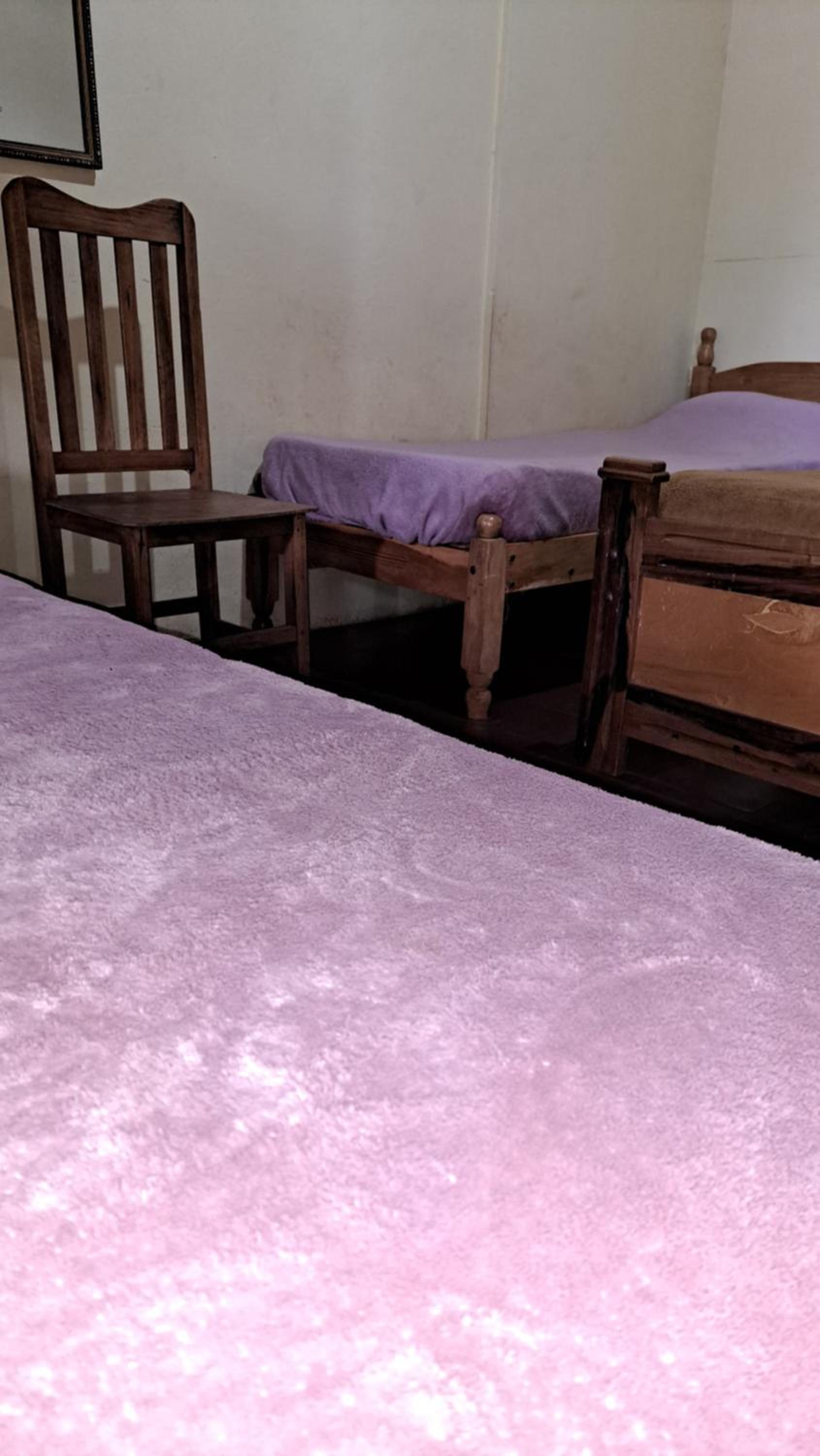Single Bed in Female Dormitory Room