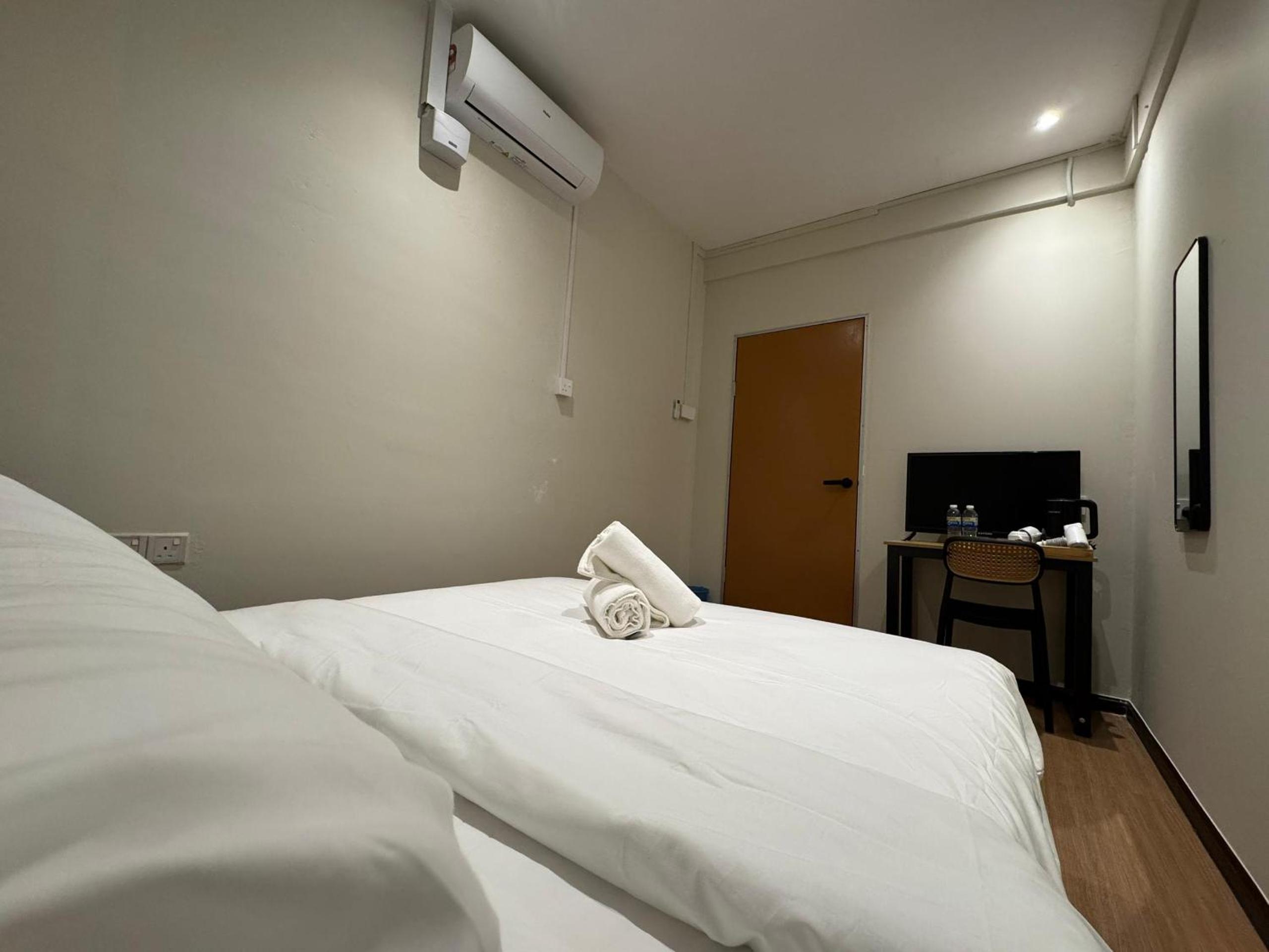 Queen Room with Shared Bathroom