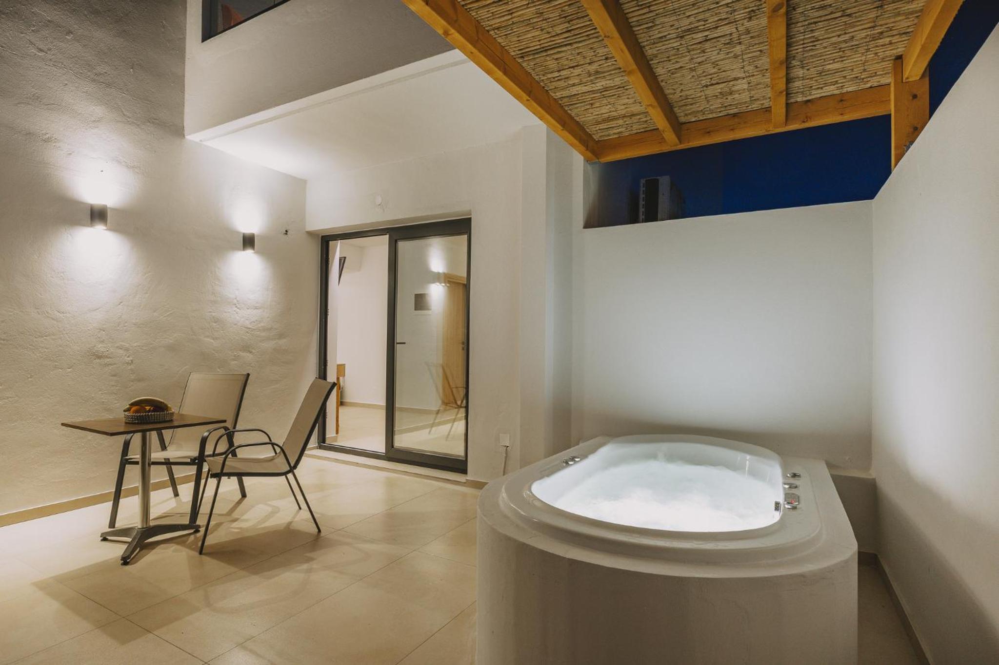 Junior Suite with Outdoor Jetted Tub photo 1