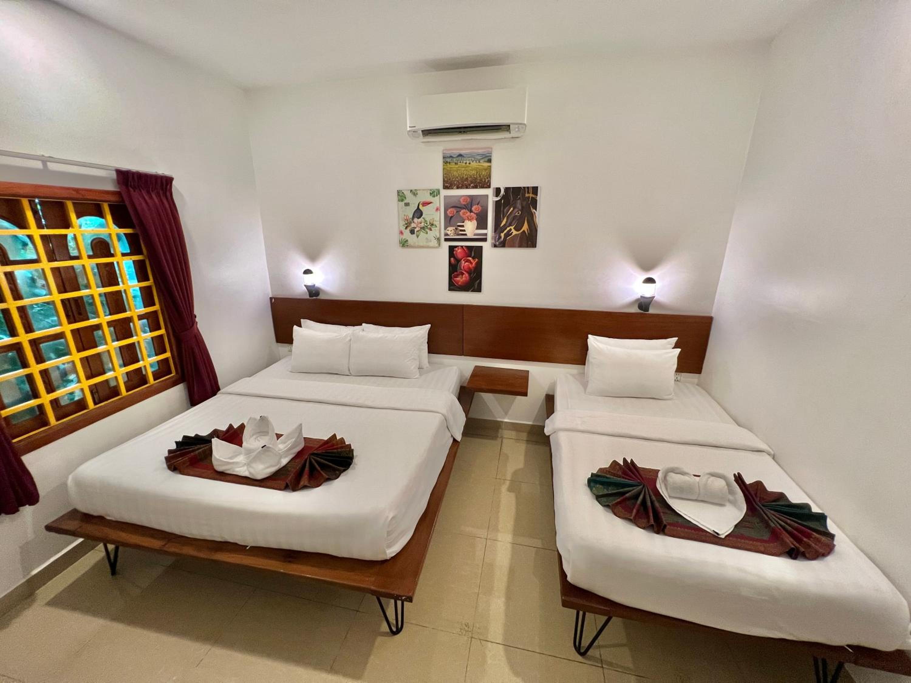 Deluxe Triple Room