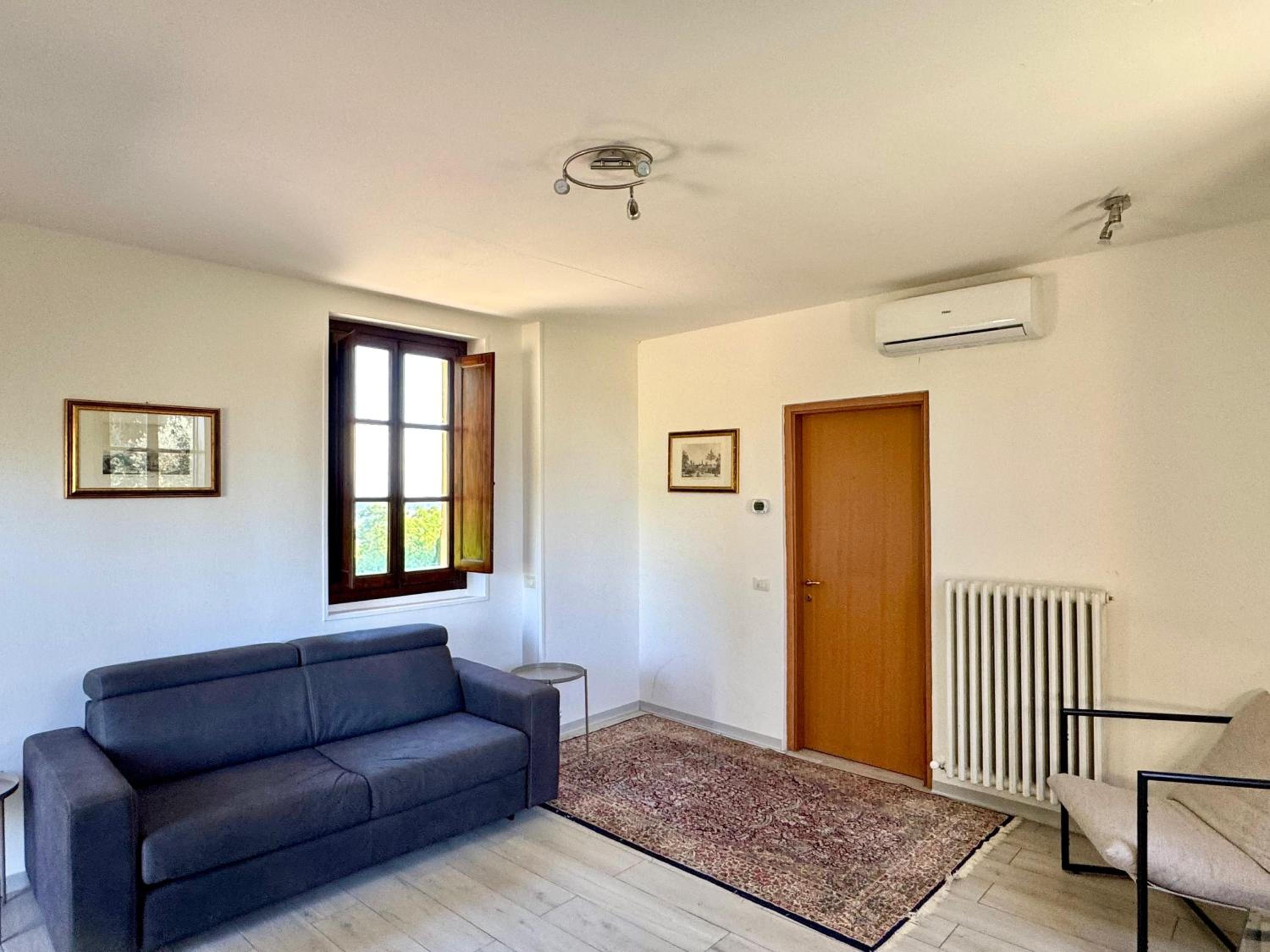 Family Room with Patio - Photo 1