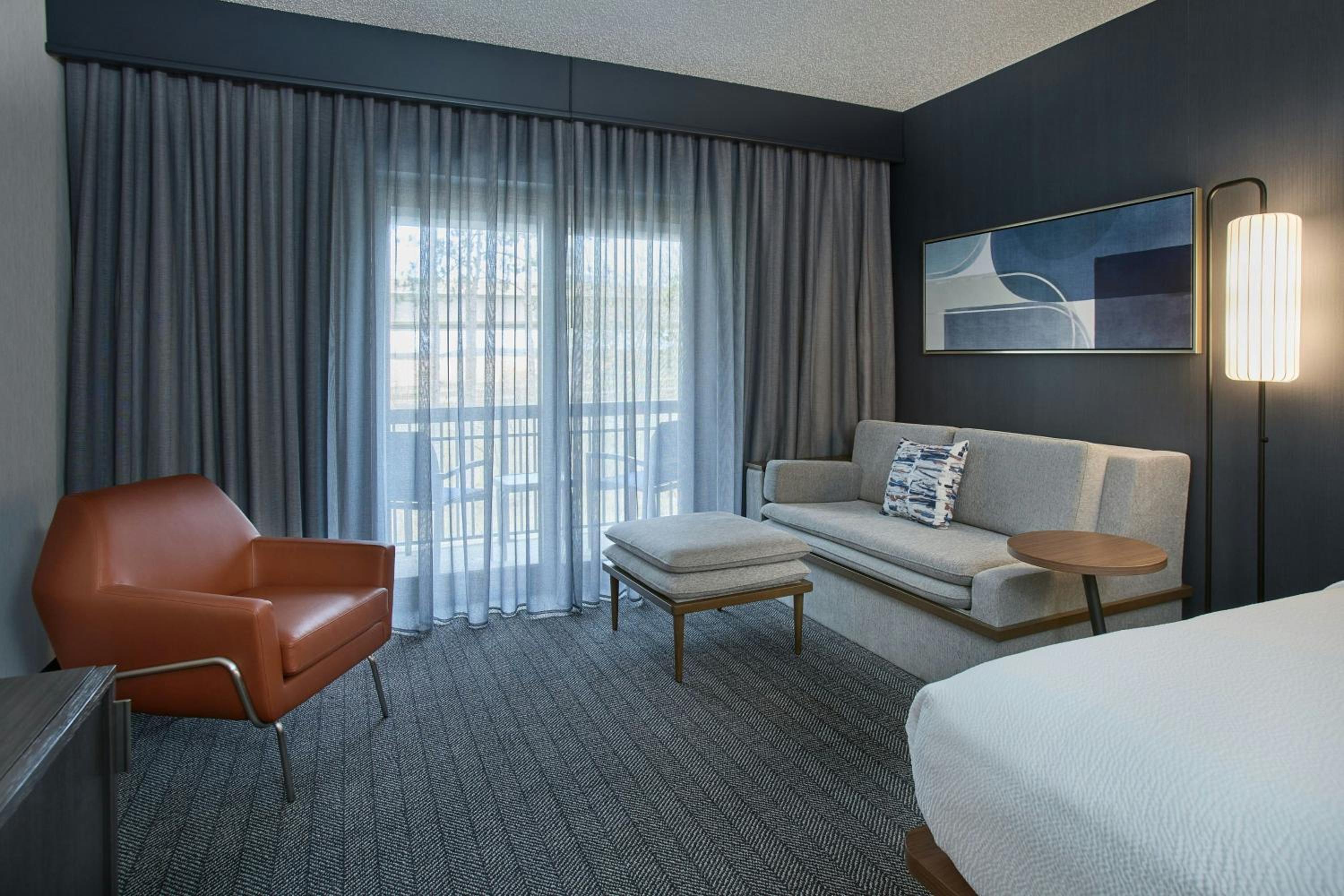 Queen Room with Two Queen Beds and Sofa Bed - Photo 1