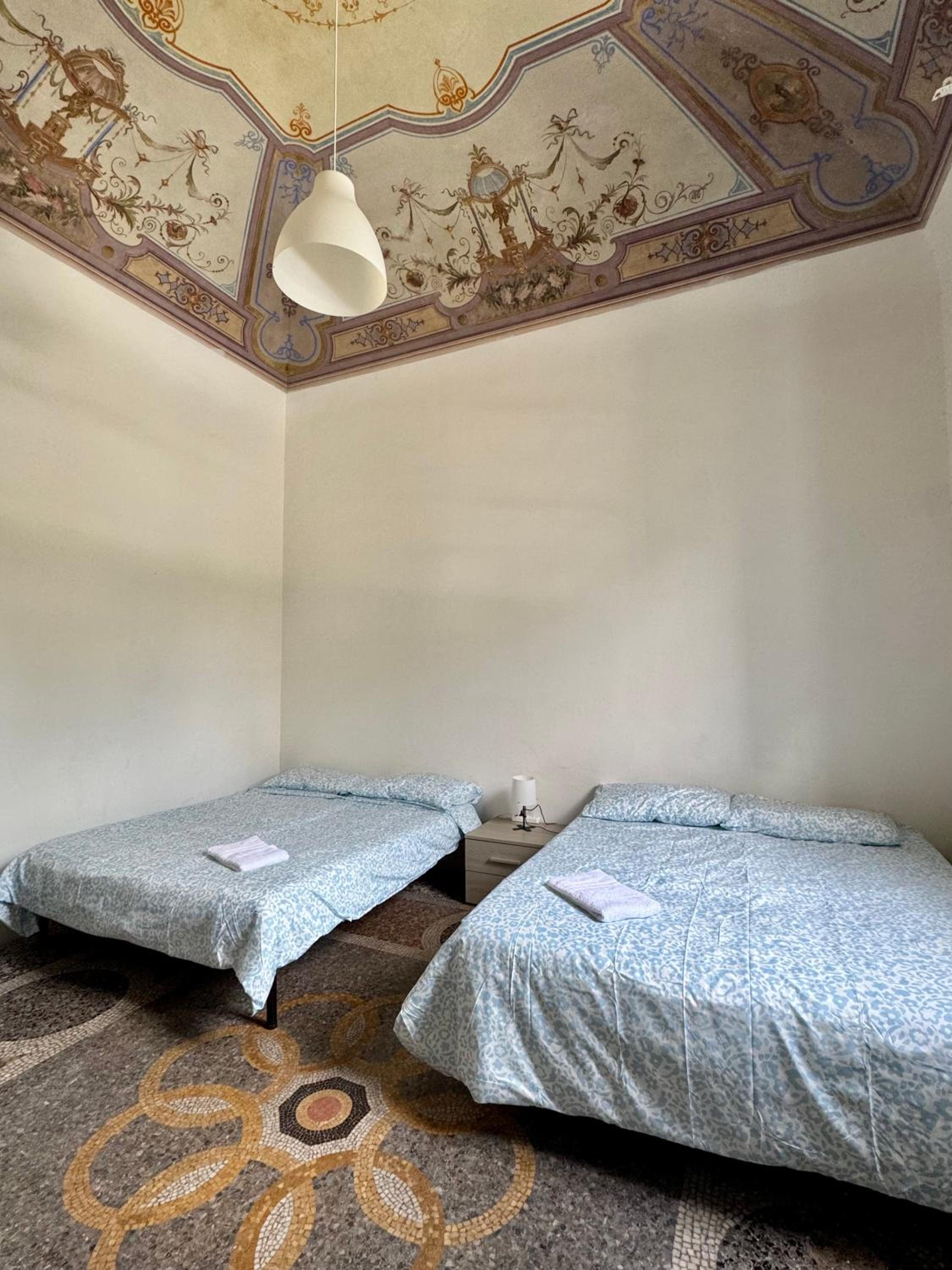Quadruple Room with Shared Bathroom
