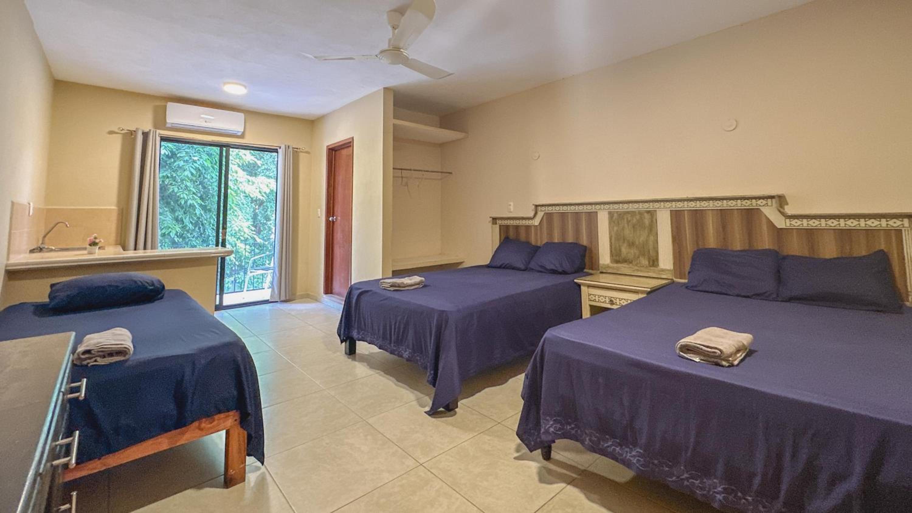 Quadruple Room with Balcony photo 2