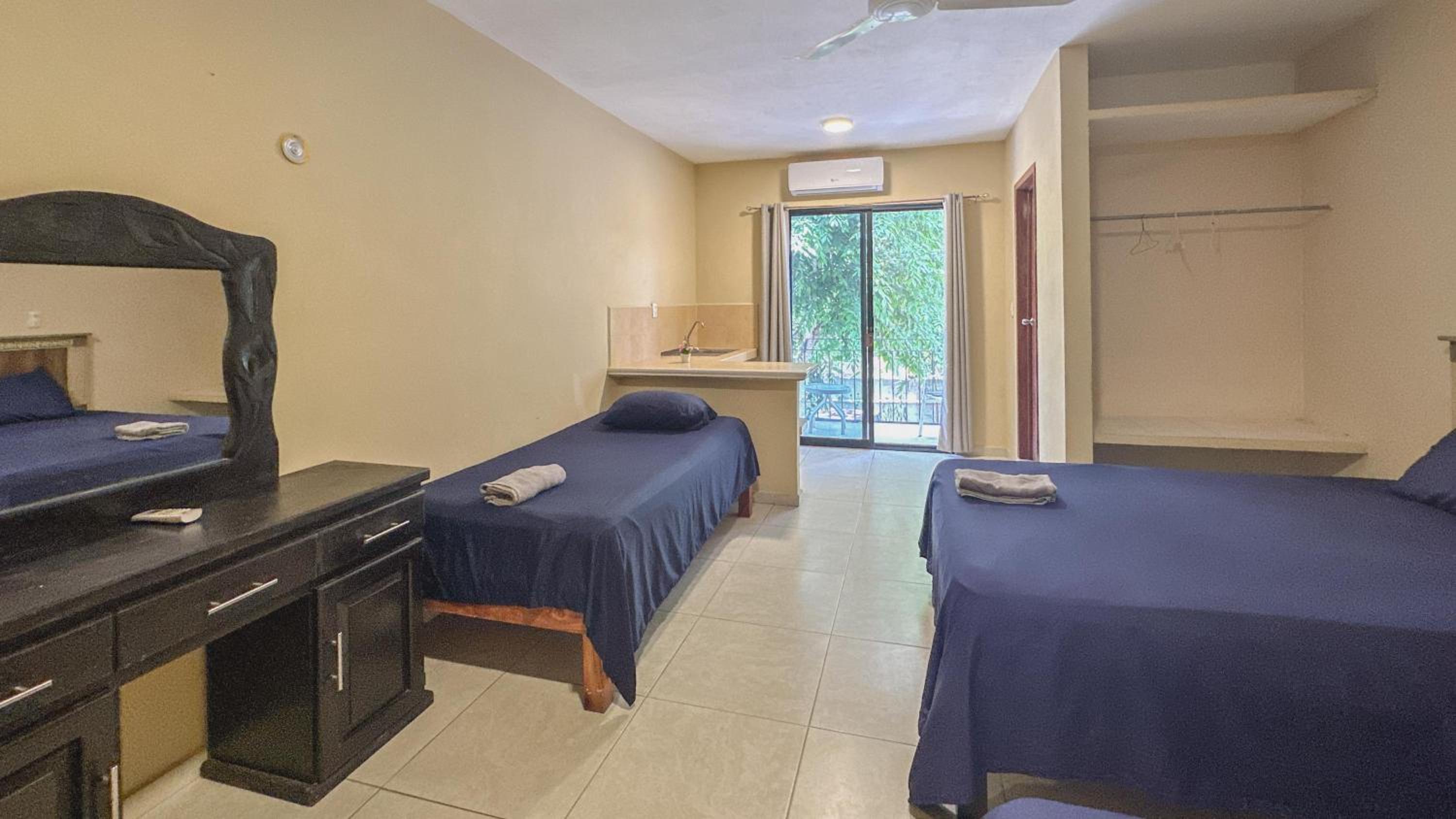 Quadruple Room with Balcony photo 3