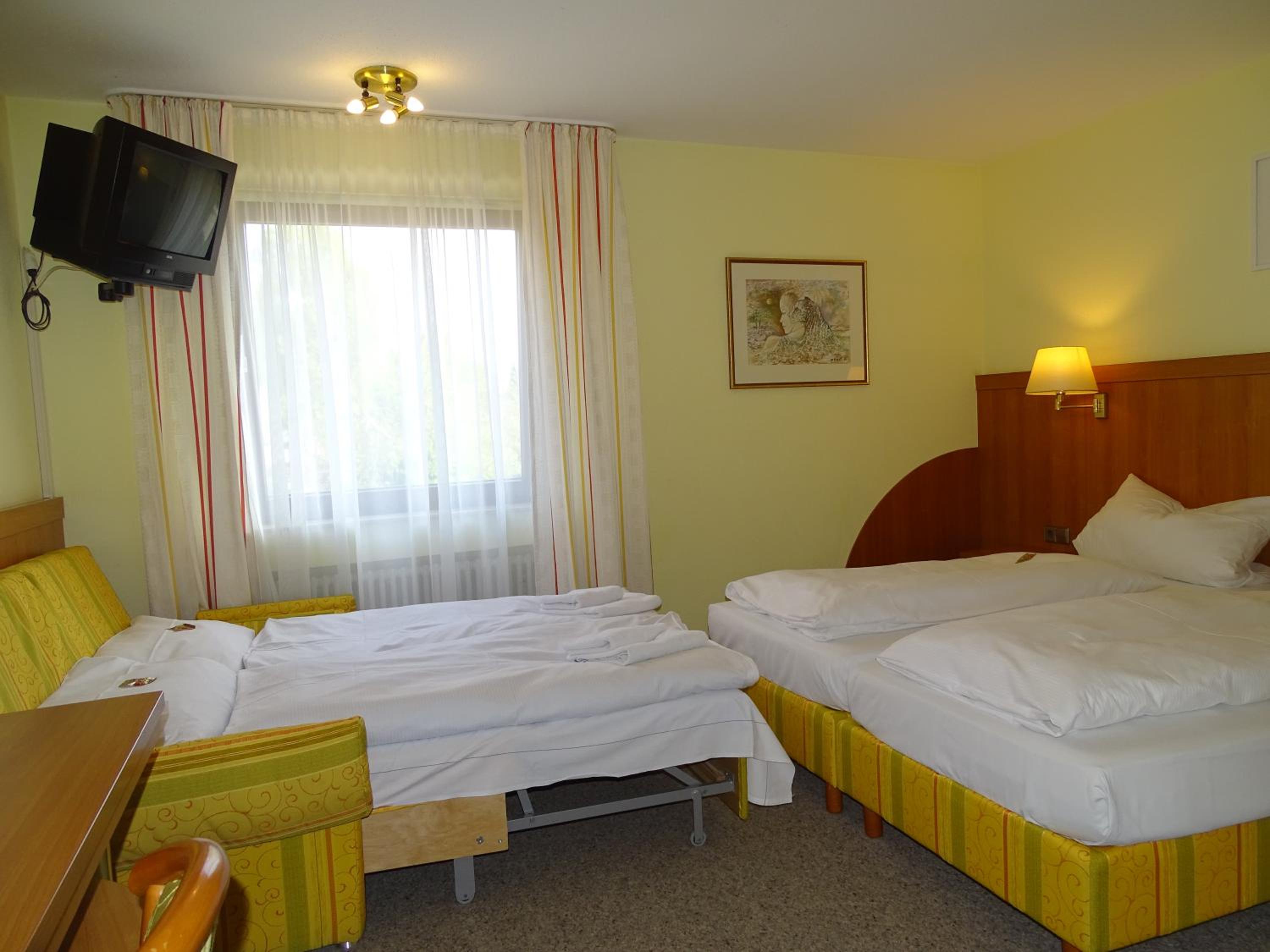 Triple Room - Photo 1
