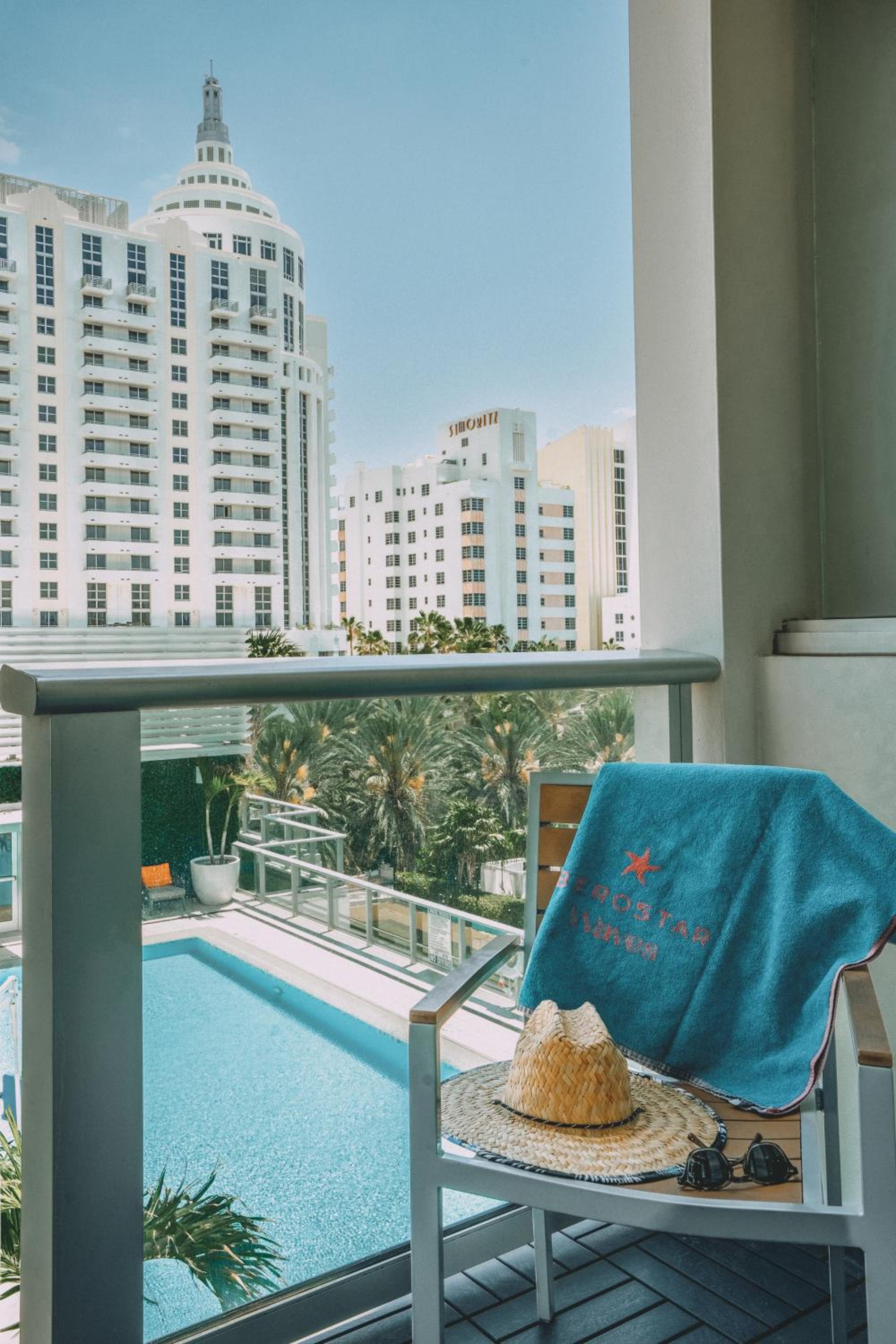 Pool View with Balcony Double Queen Single Use photo 2