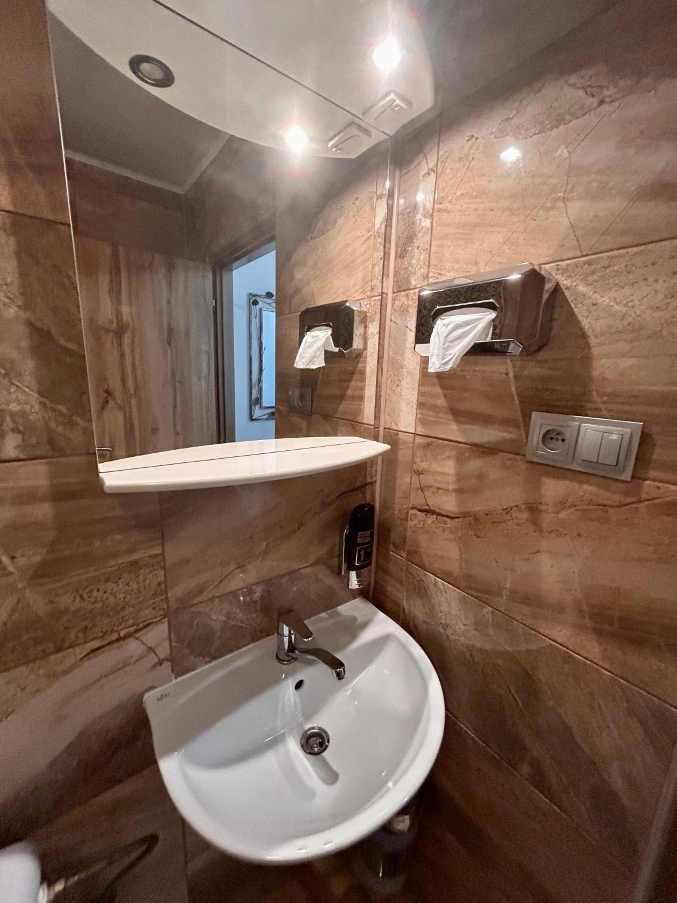 Quadruple Room with Private Bathroom