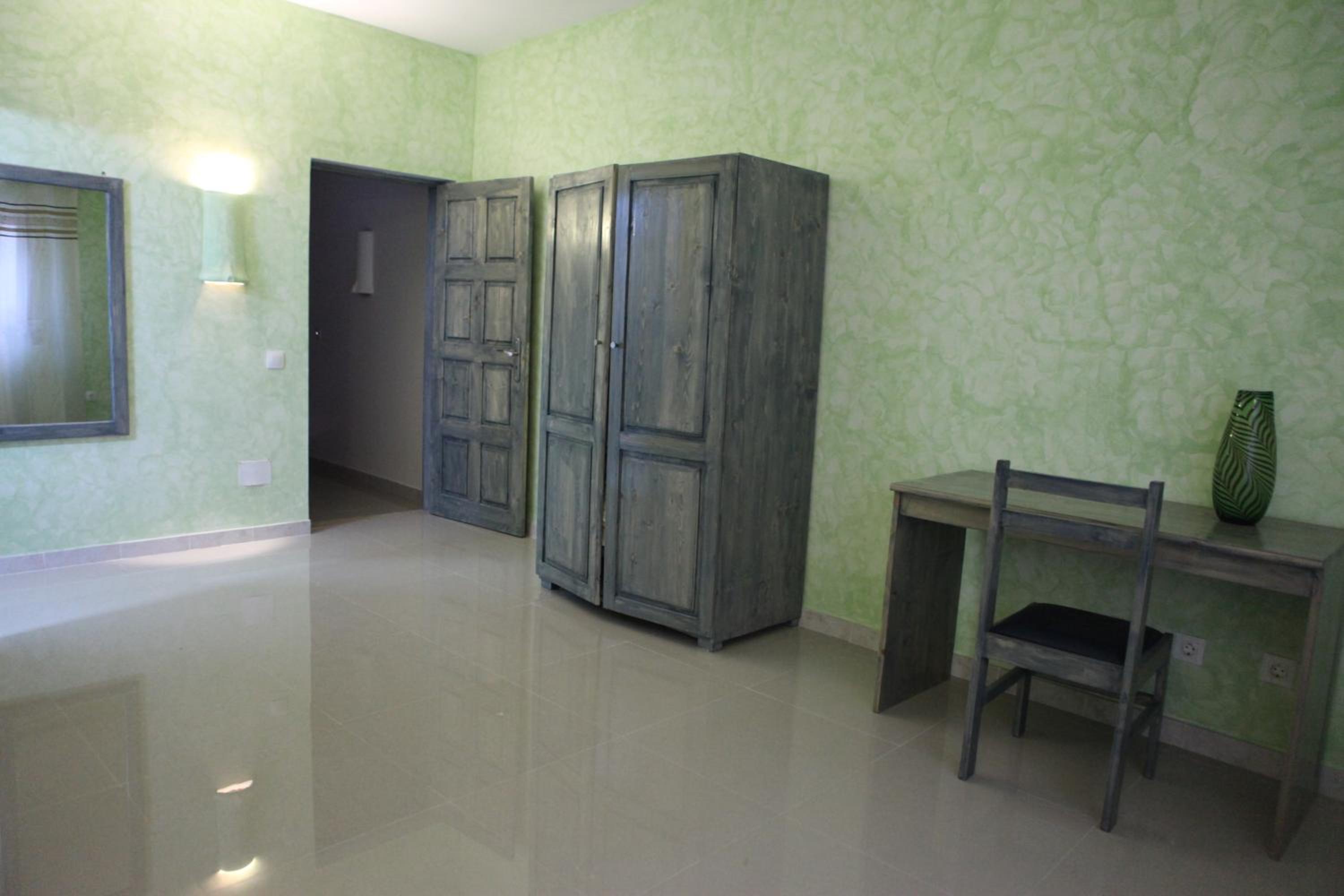 Quadruple Room with Private Bathroom photo 2