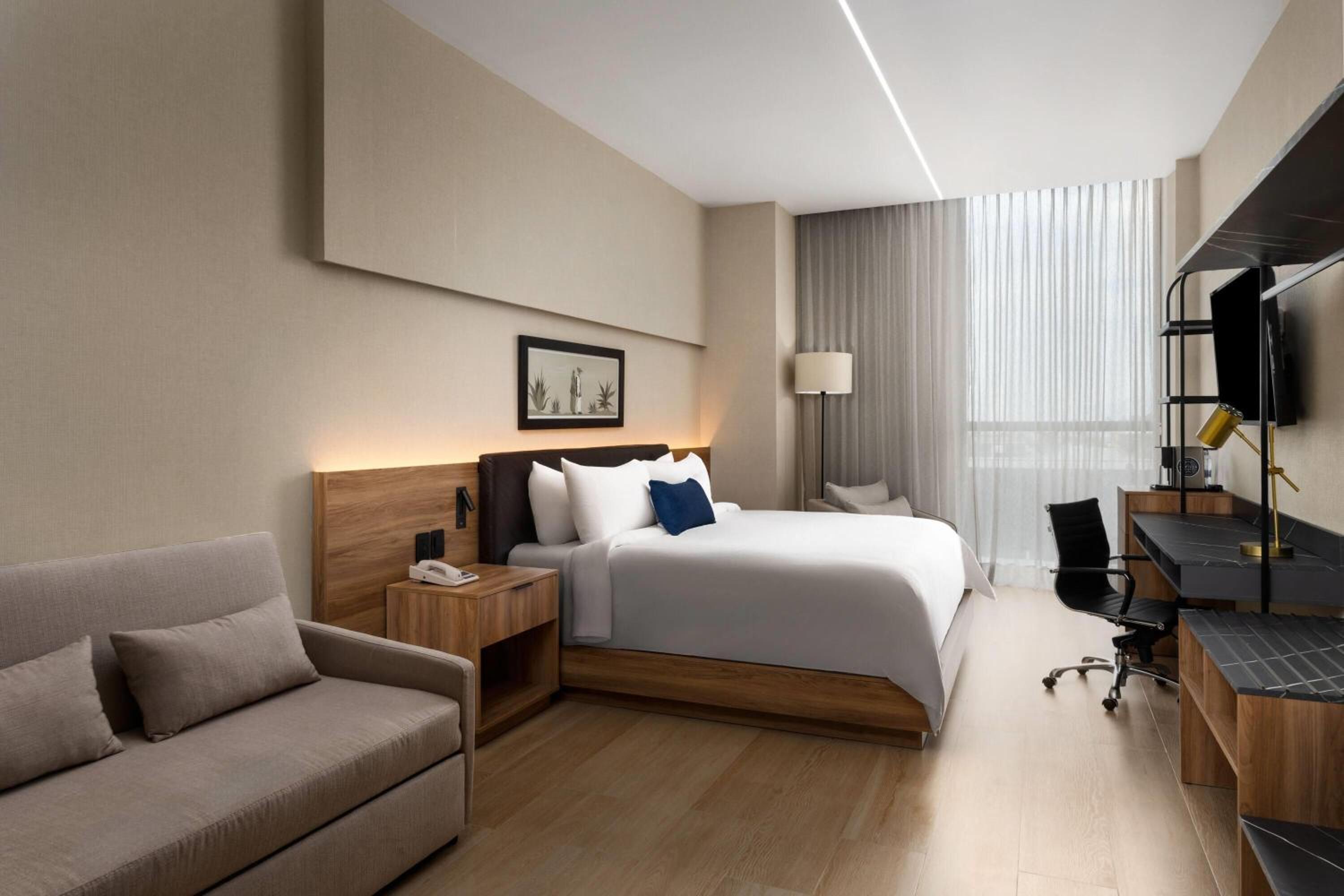 Family Room with One King Bed and Sofa Bed - Non-Smoking - Photo 1