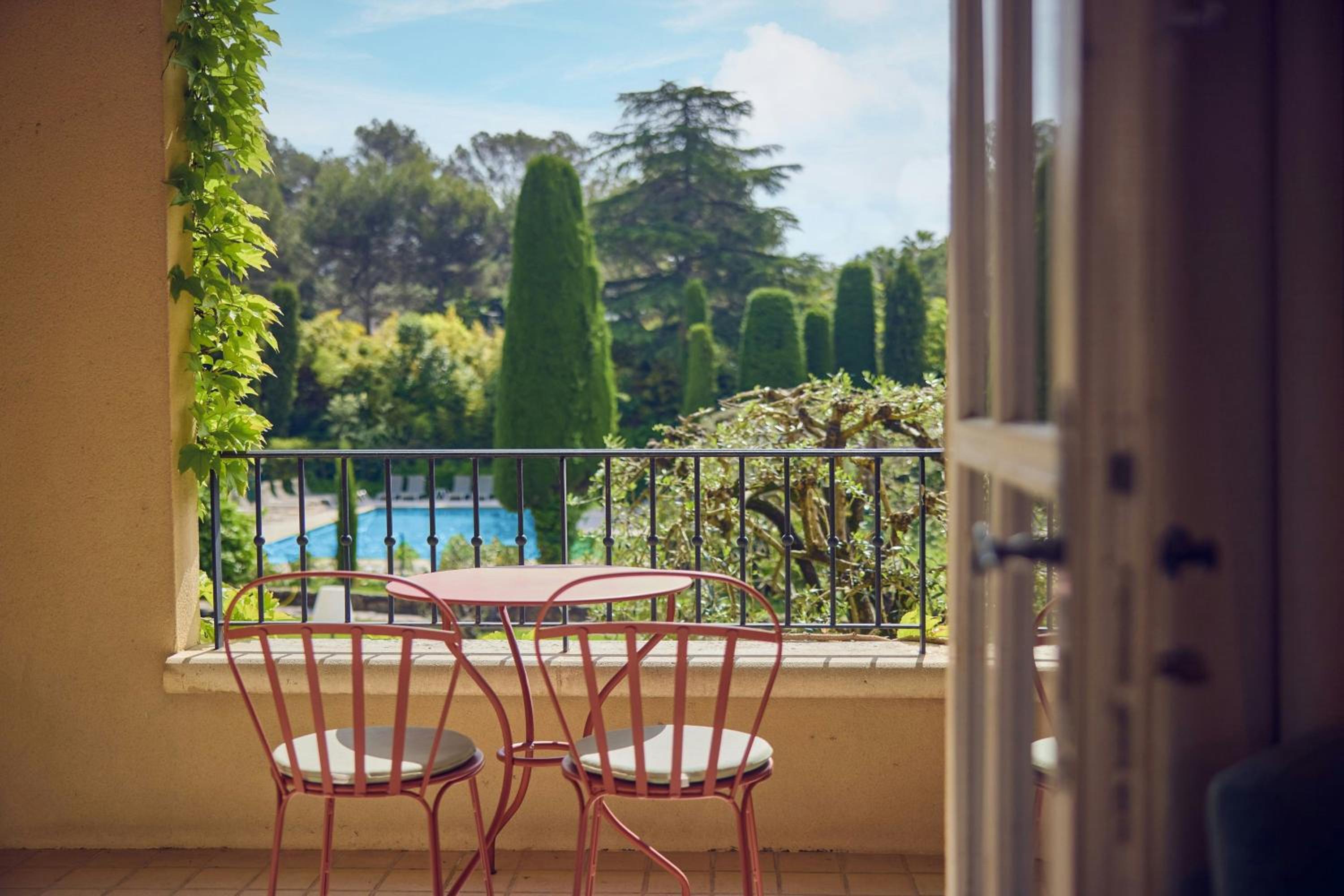 Junior King Suite with Sofa Bed, Balcony and Garden View