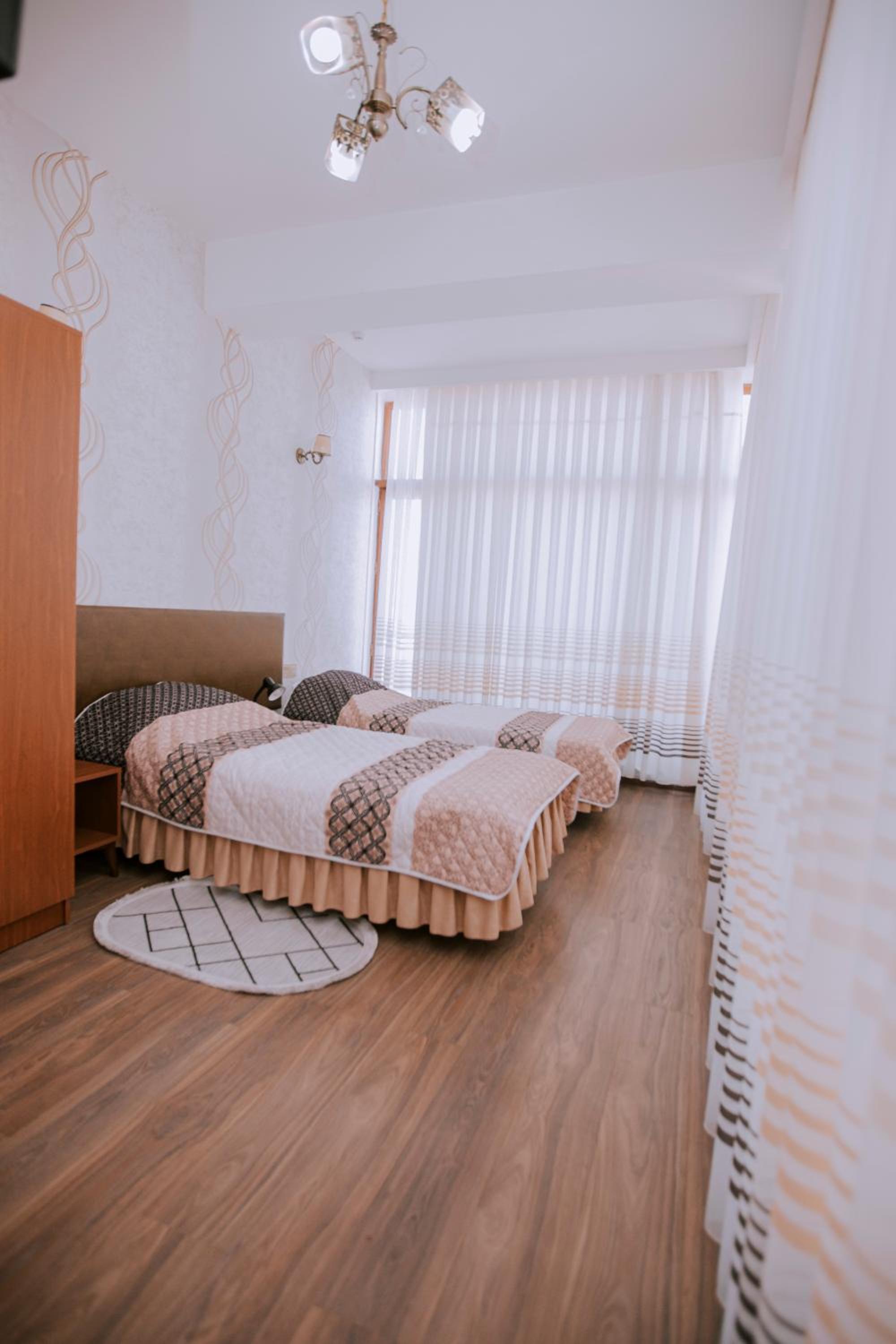 Quadruple Room with Private Bathroom