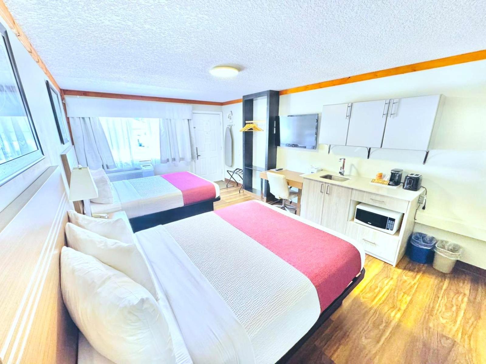 Queen Room with Two Queen Beds and Kitchenette - Non-Smoking - Photo 1
