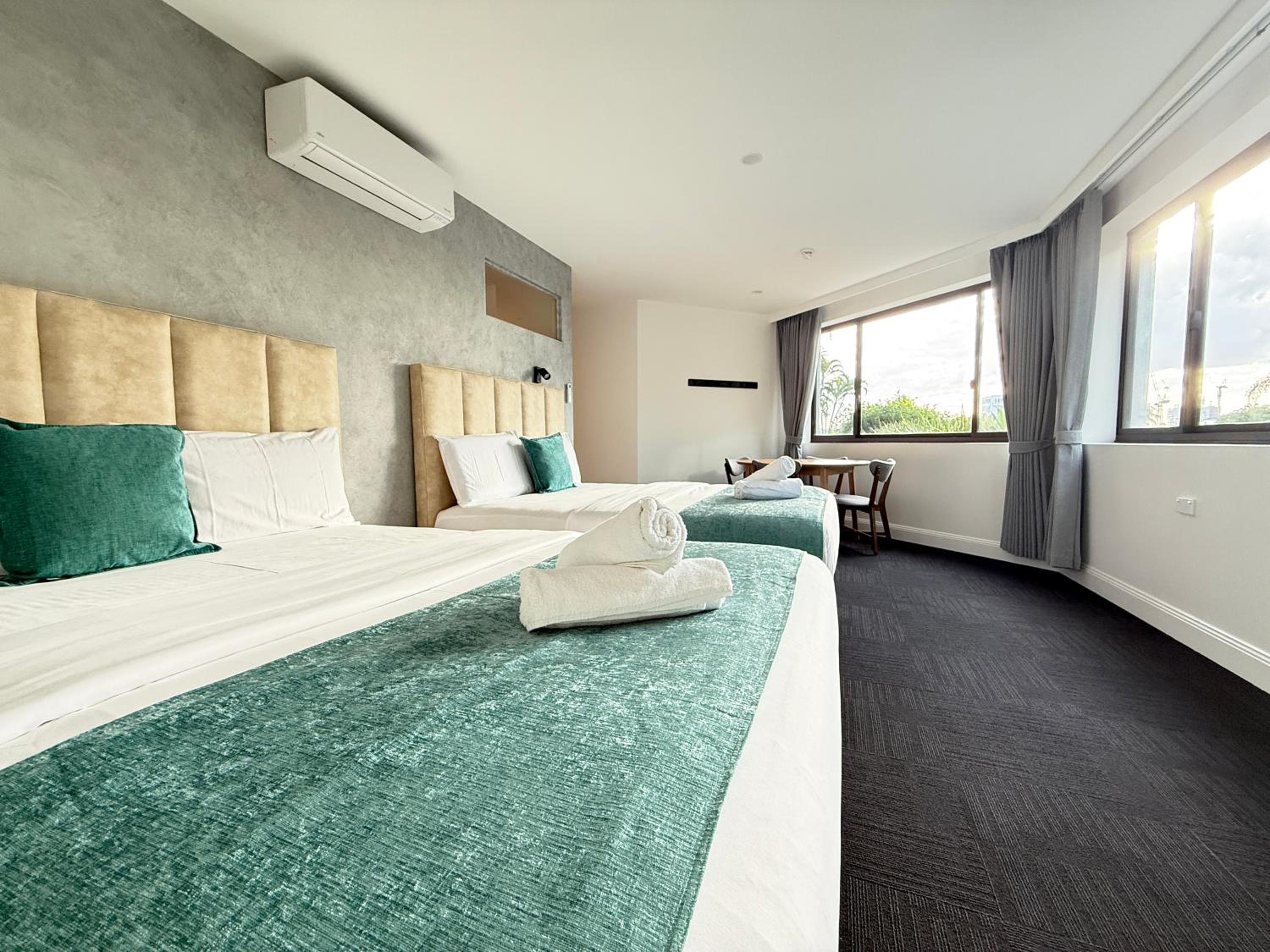 Deluxe Queen Room with Two Queen Beds photo 1