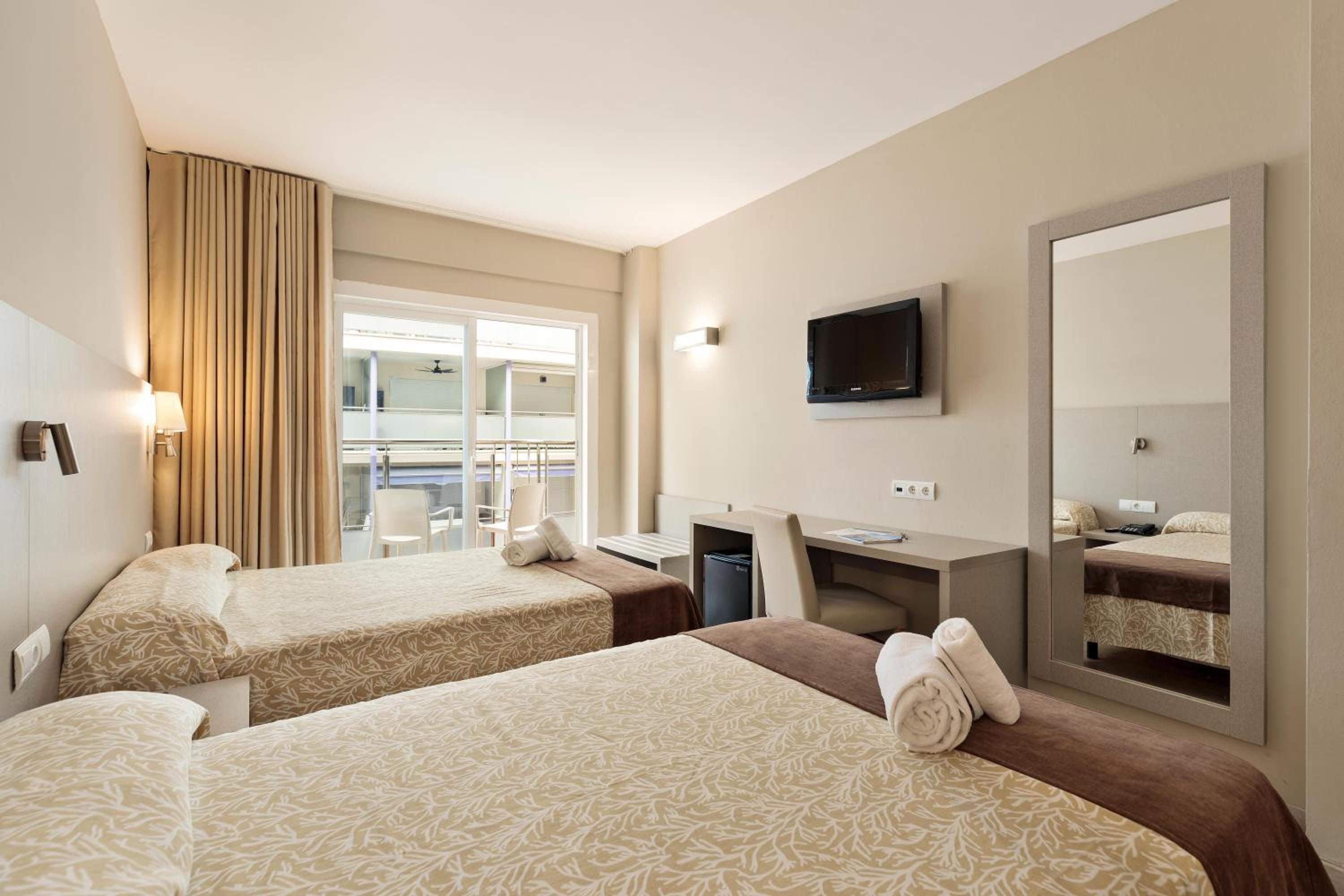 Double or Twin Room without a view (3 Adults + 1 Child)
