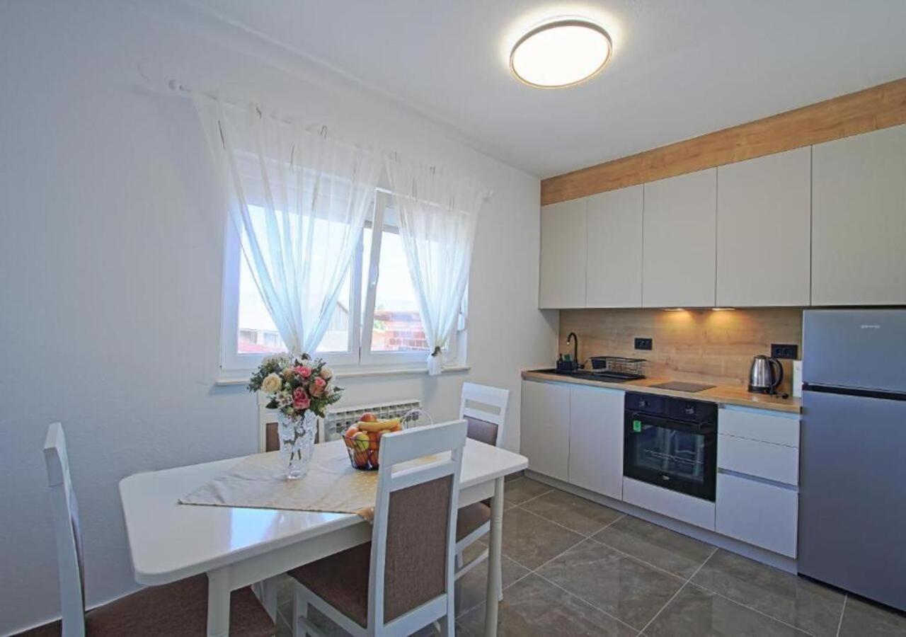 Four-Bedroom Apartment with Balcony 