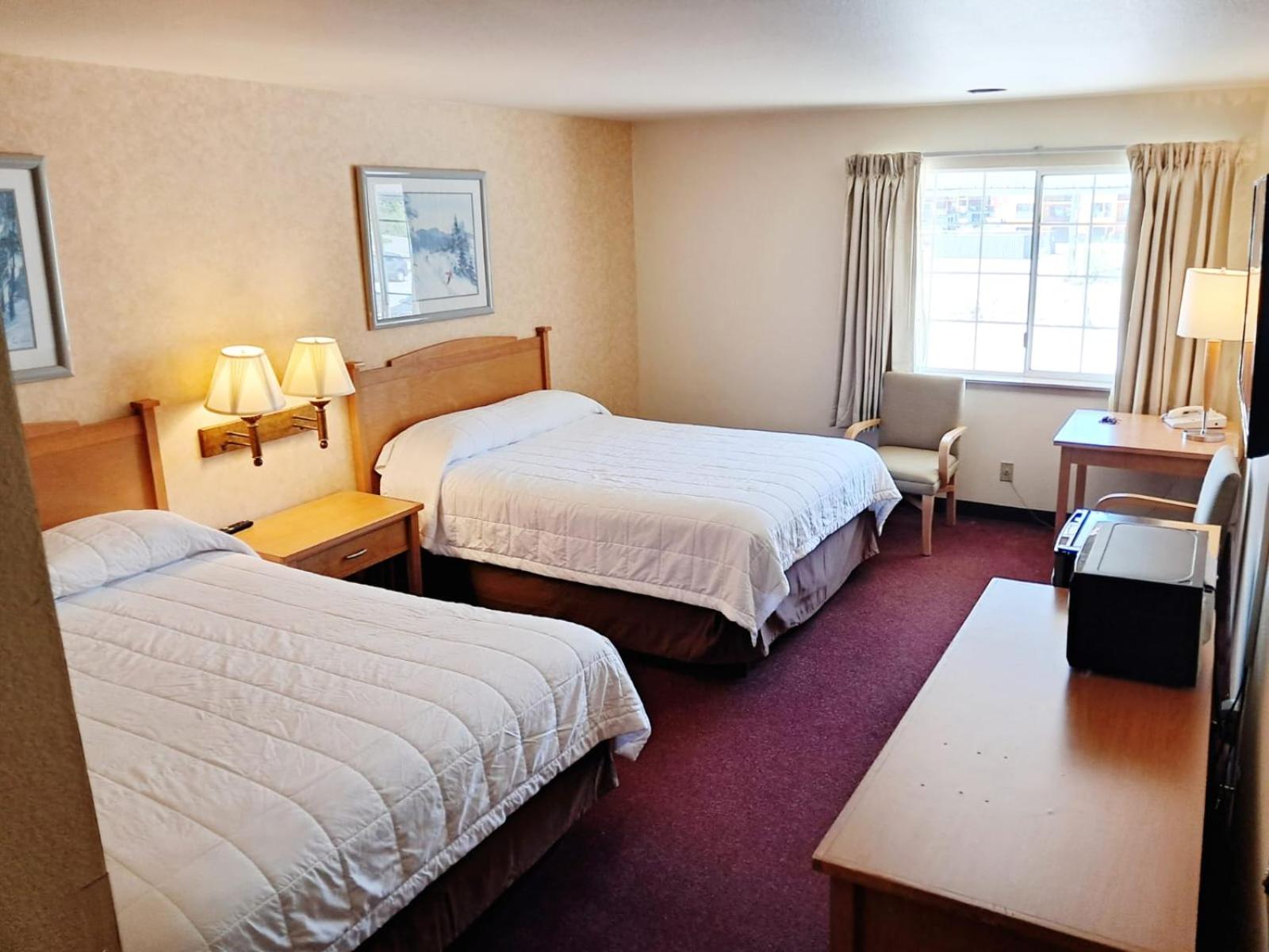 Queen Room with Two Queen Beds Pet Free photo 2